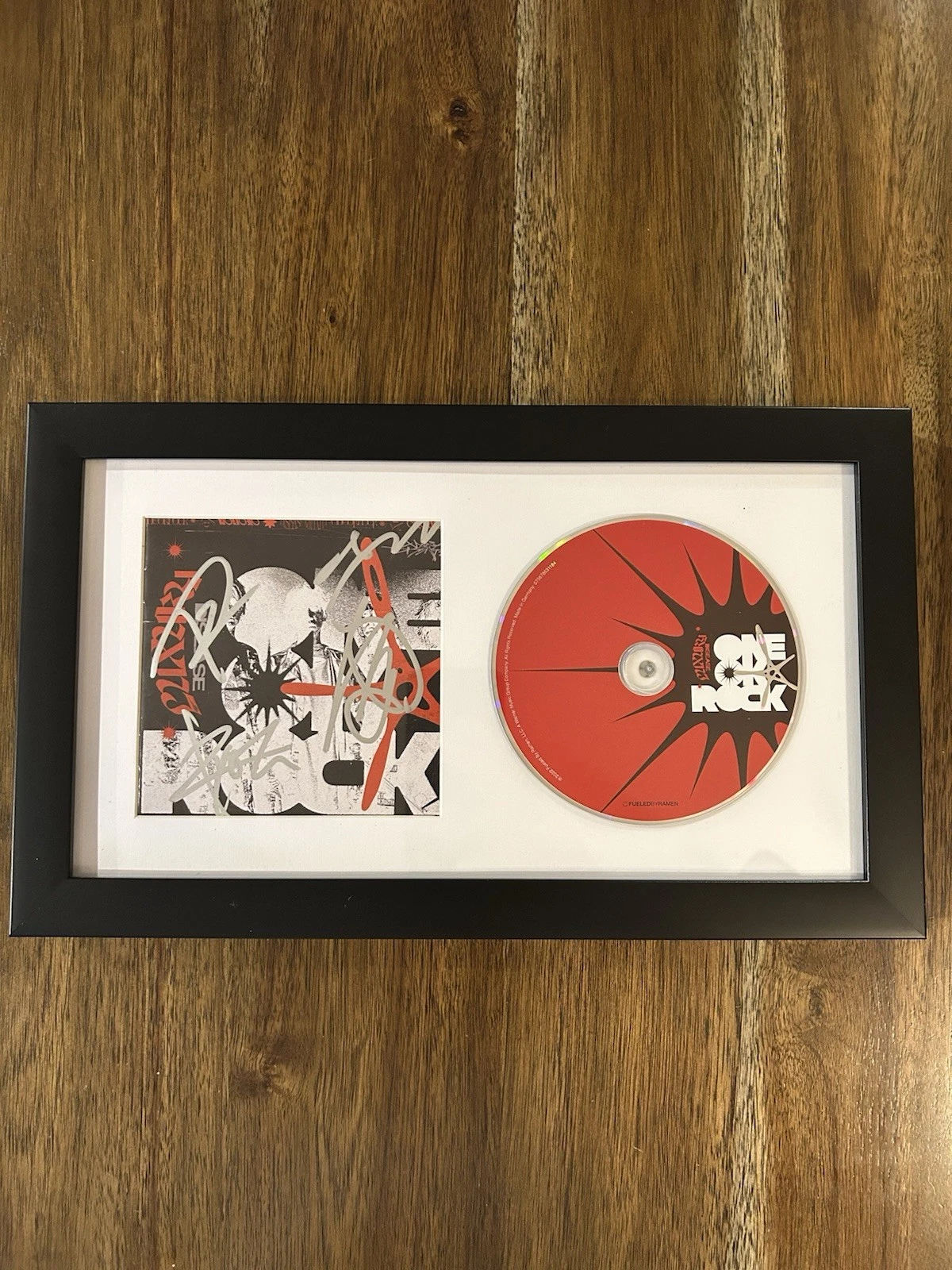 ‘ONE OK ROCK’ FULL BAND SIGNED FRAMED CD DISPLAY ‘LUXURY DISEASE’ RARE TAKA +3 COLLECTIBLE MEMORABILIA