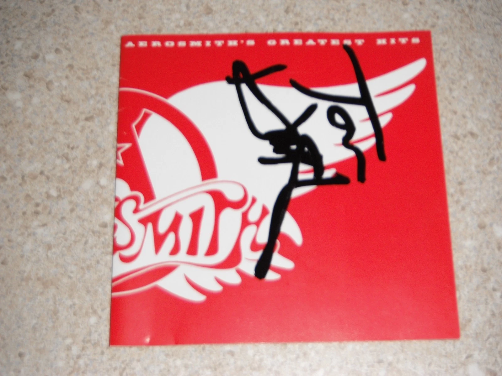 AEROSMITH TOM HAMILTON SIGNED GREATEST HITS CD COVER