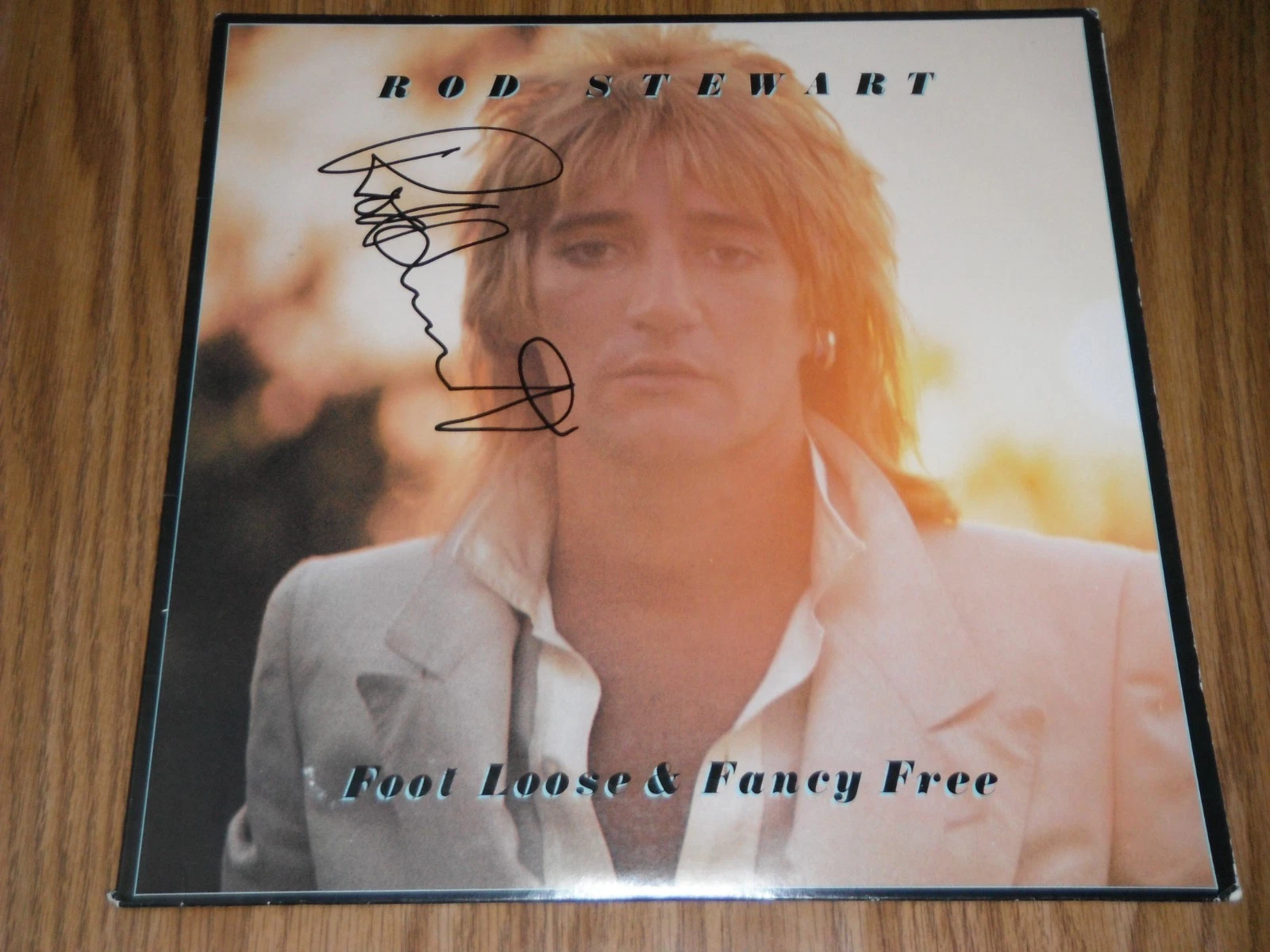 ROD STEWART SIGNED FOOT LOOSE AND FANCY FREE LADY VINYL ALBUM