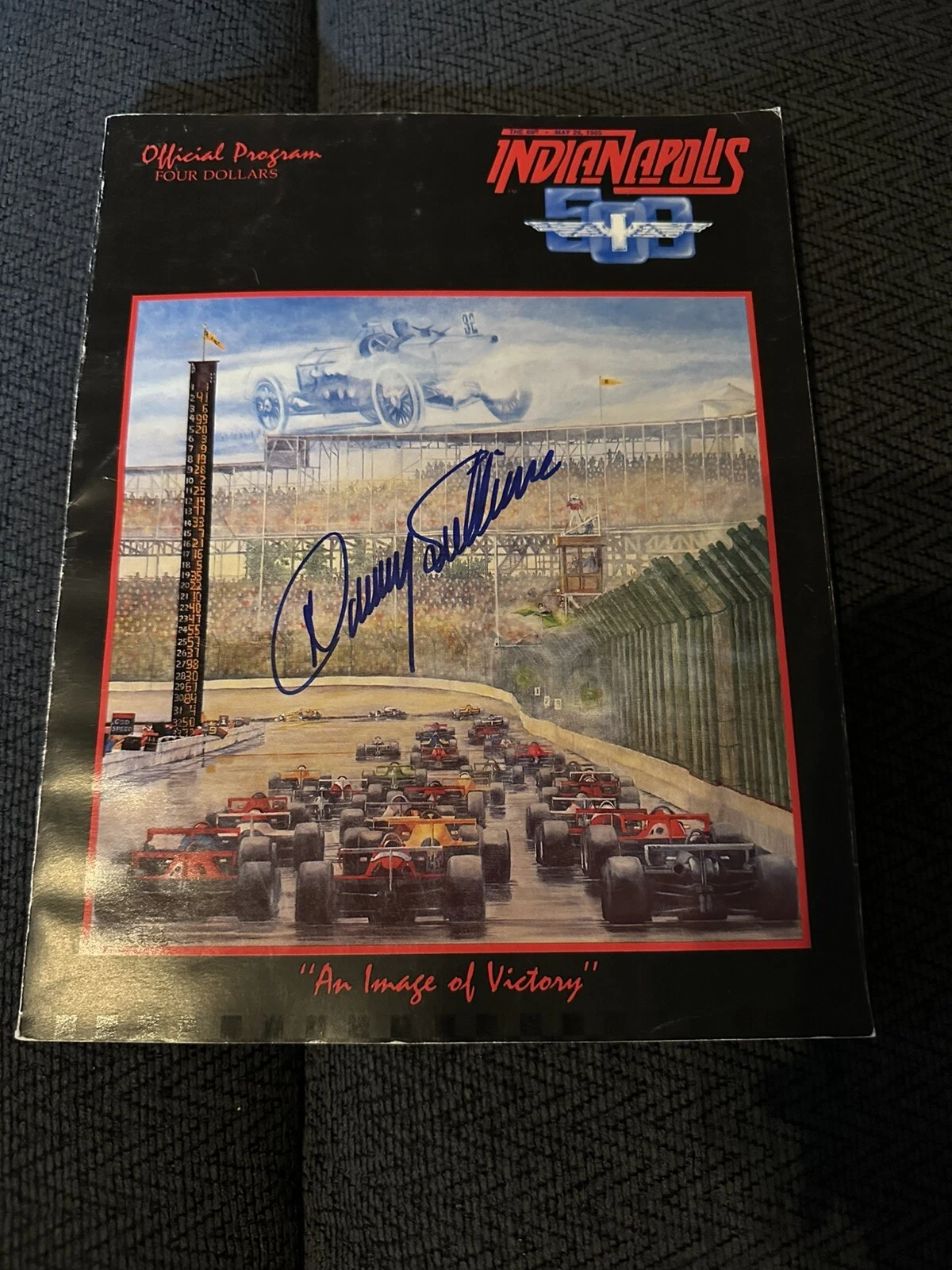 1985 INDY 500 PROGRAM SIGNED BY WINNER DANNY SULLIVAN AUTOGRAPHED COLLECTIBLE MEMORABILIA