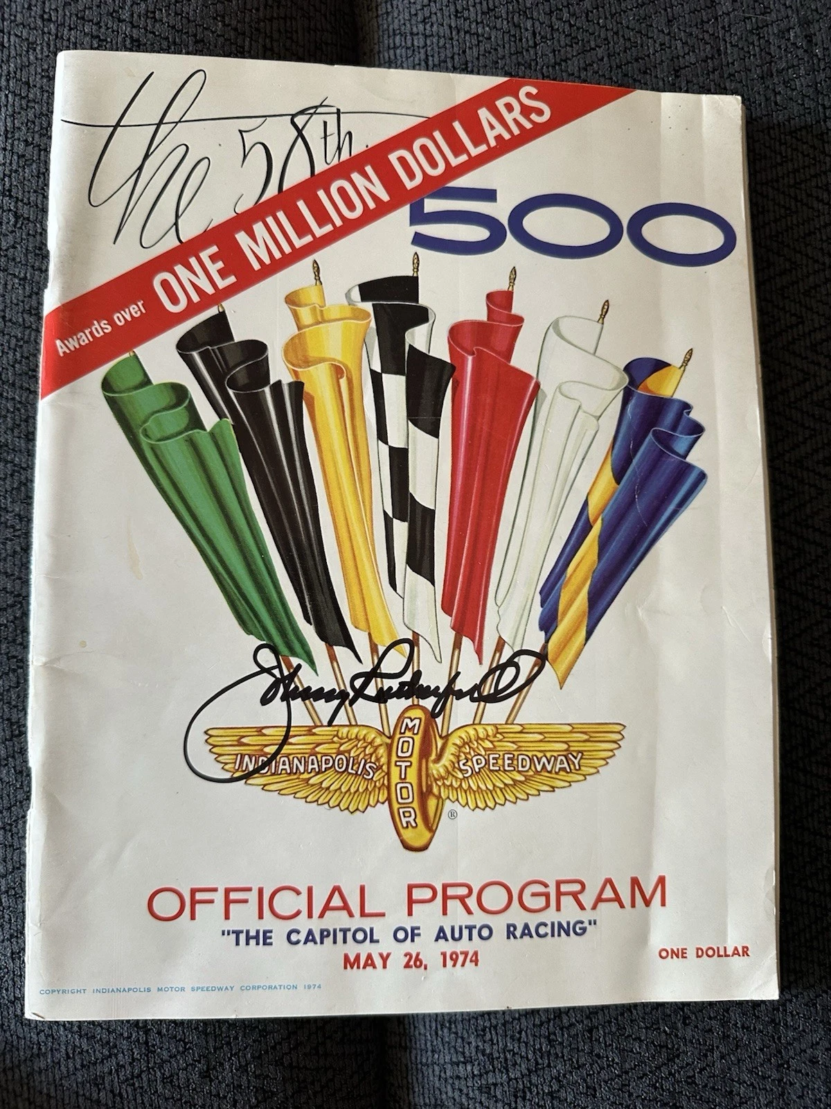 1974 INDY 500 PROGRAM SIGNED BY WINNER JOHNNY RUTHERFORD AUTOGRAPHED COLLECTIBLE MEMORABILIA