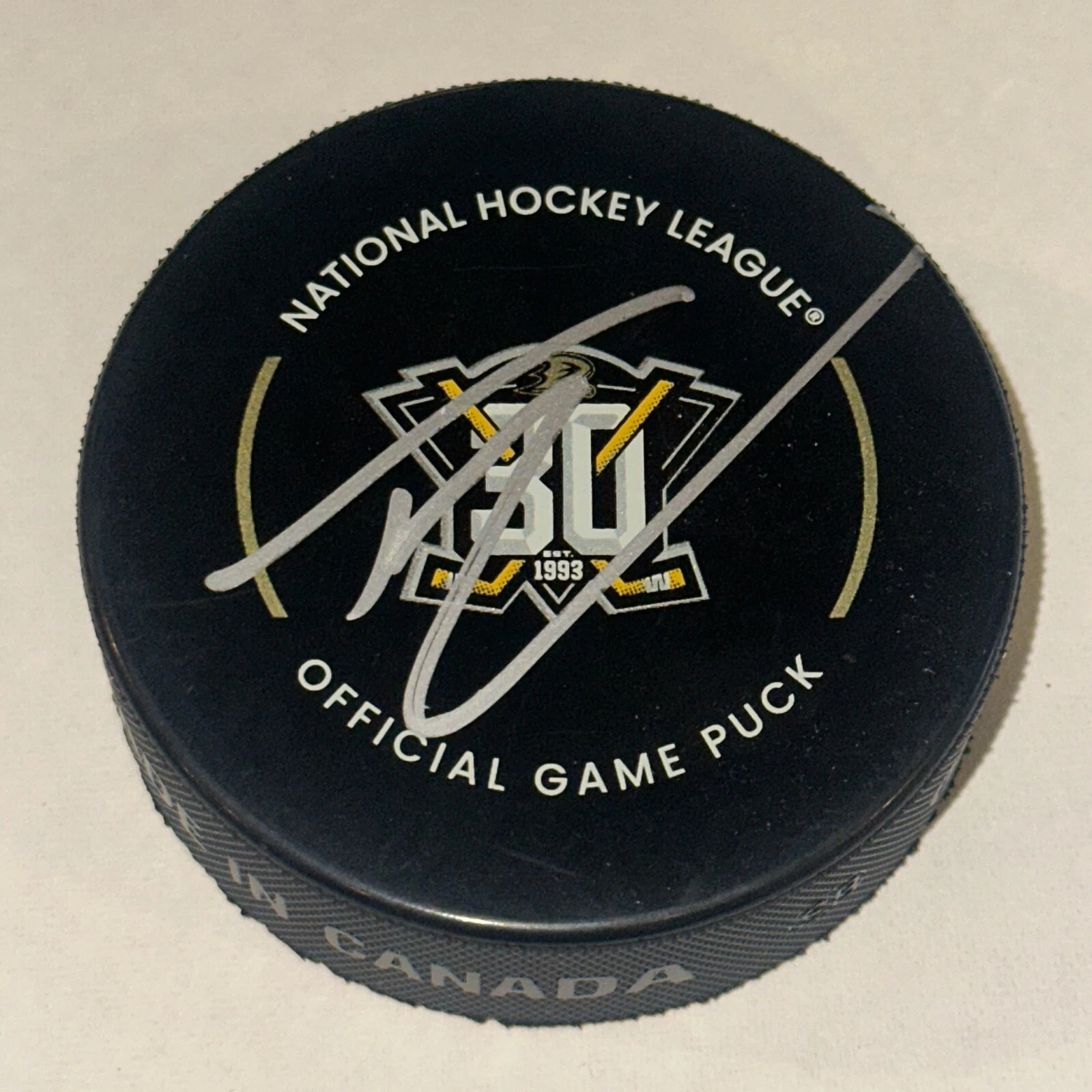 TREVOR ZEGRAS Signed Anaheim DUCKS 30th Anniv Official GAME Puck Beckett (BAS)