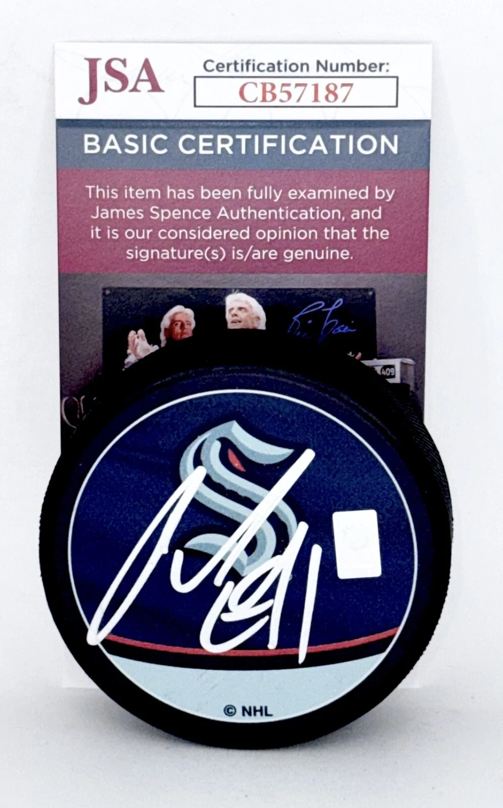 Ryker Evans signed Seattle Kraken Reverse Retro Puck autographed JSA