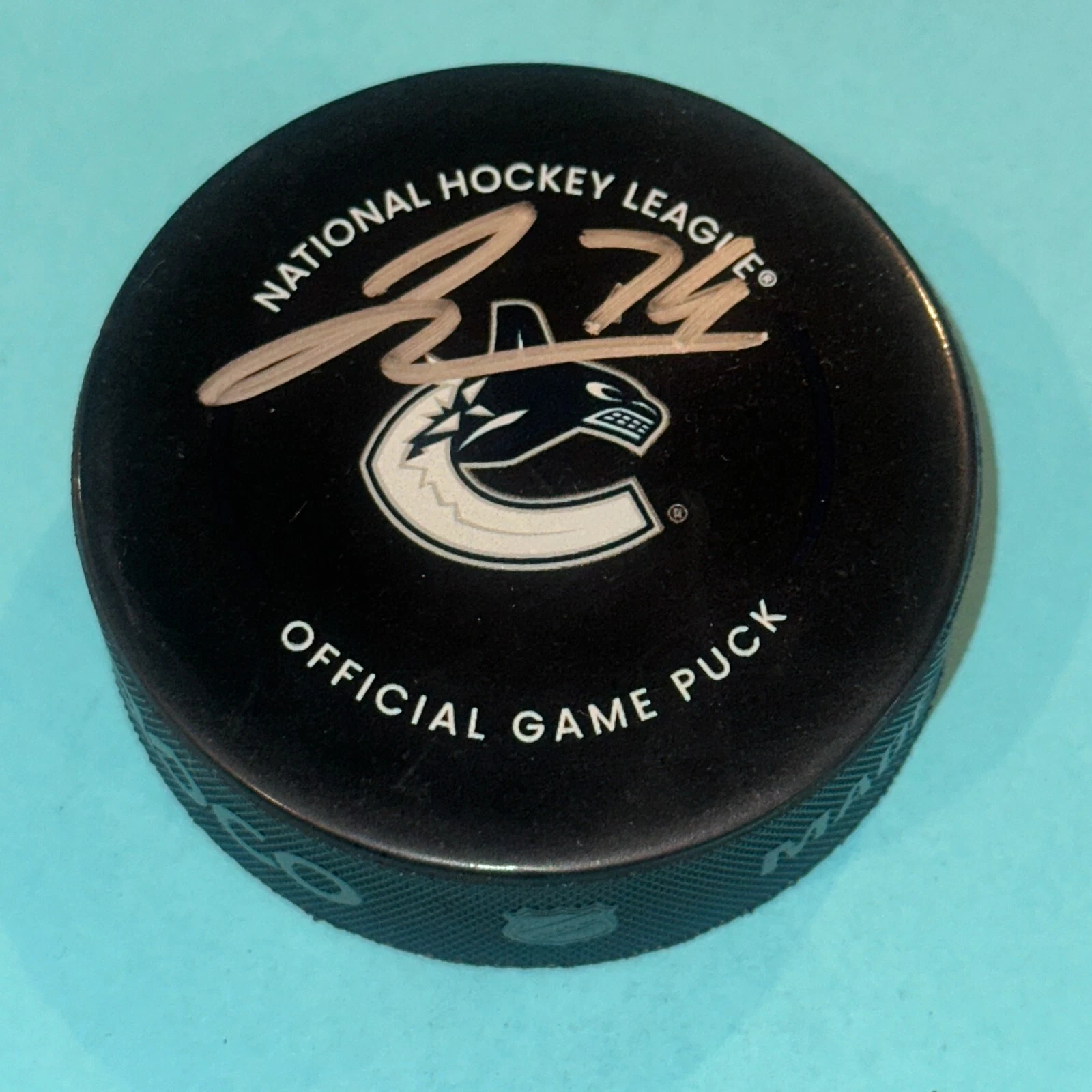 JAKE DEBRUSK Signed Vancouver CANUCKS Official GAME Puck Beckett Auth (BAS)