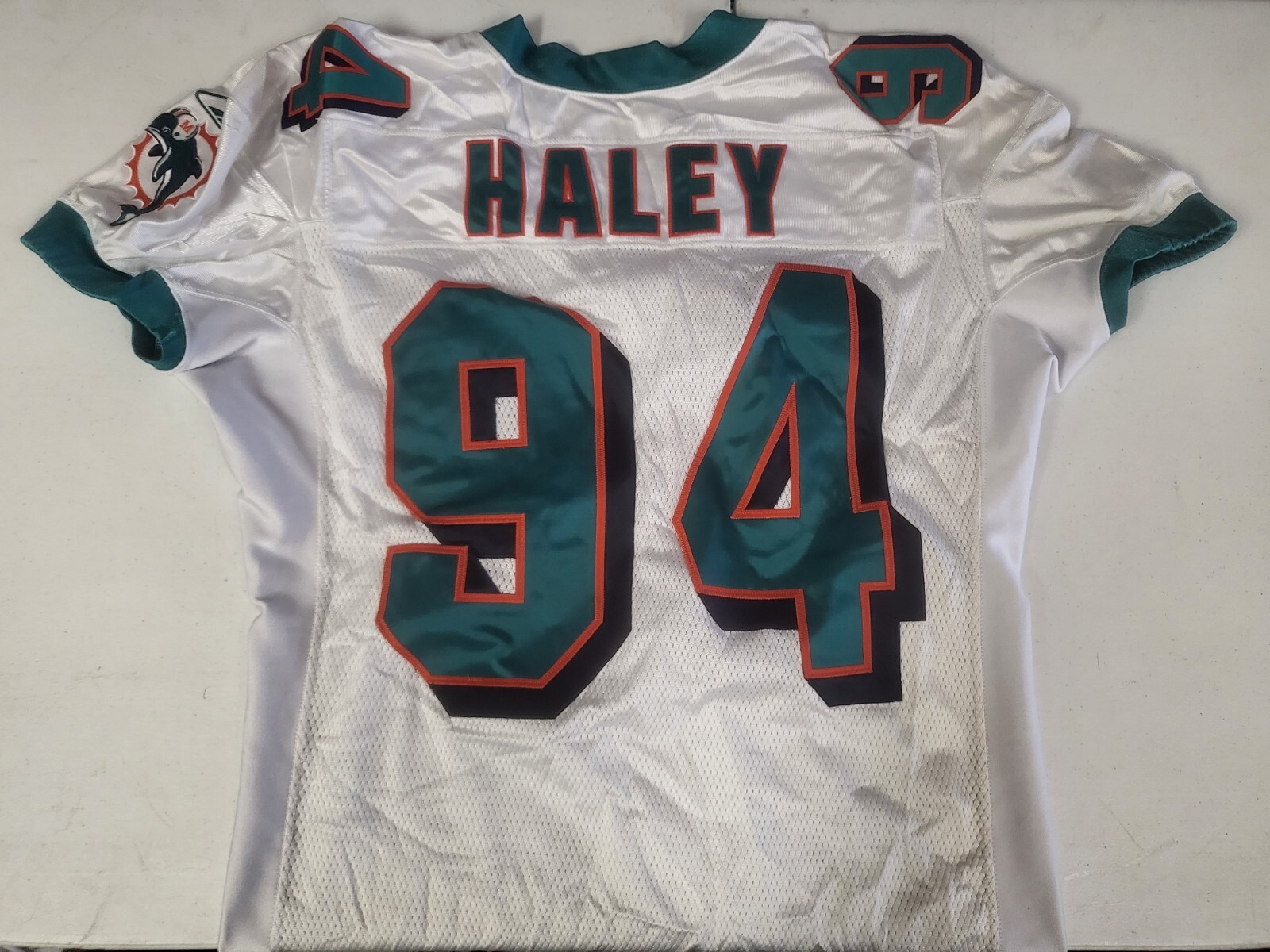 MIAMI DOLPHINS JERMAINE HALEY #94 GAME ISSUED REEBOK NFL FOOTBALL JERSEY