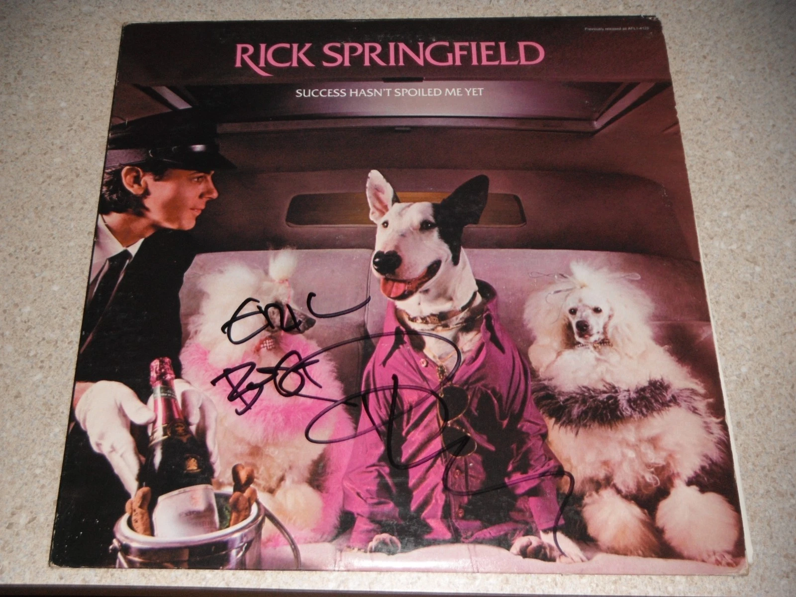 RICK SPRINGFIELD SIGNED SUCCESS HASNT SPOILED ME YET VINYL ALBUM