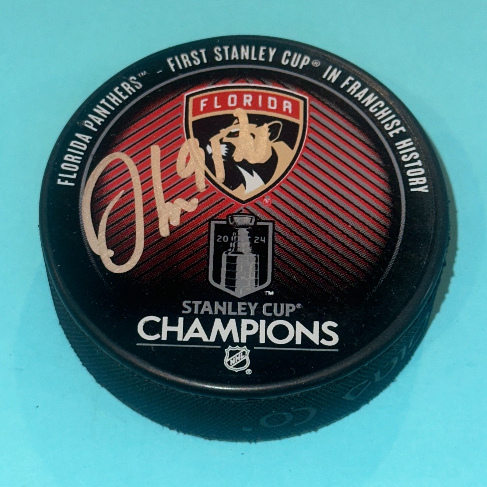 OLIVER EKMAN-LARSSON (Panthers) Signed 2024 STANLEY CUP CHAMPS Puck Beckett BAS