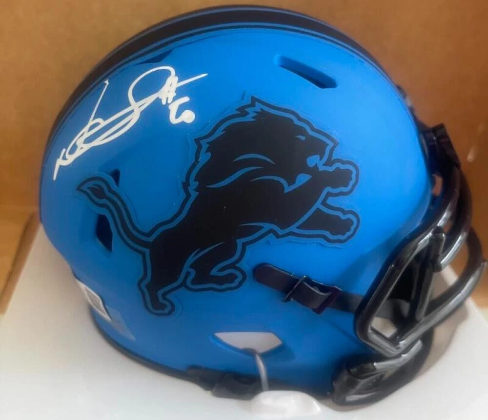 NDAMUKONG SUH SIGNED RAVE MINI HELMET BECKETT AUTHENTIC