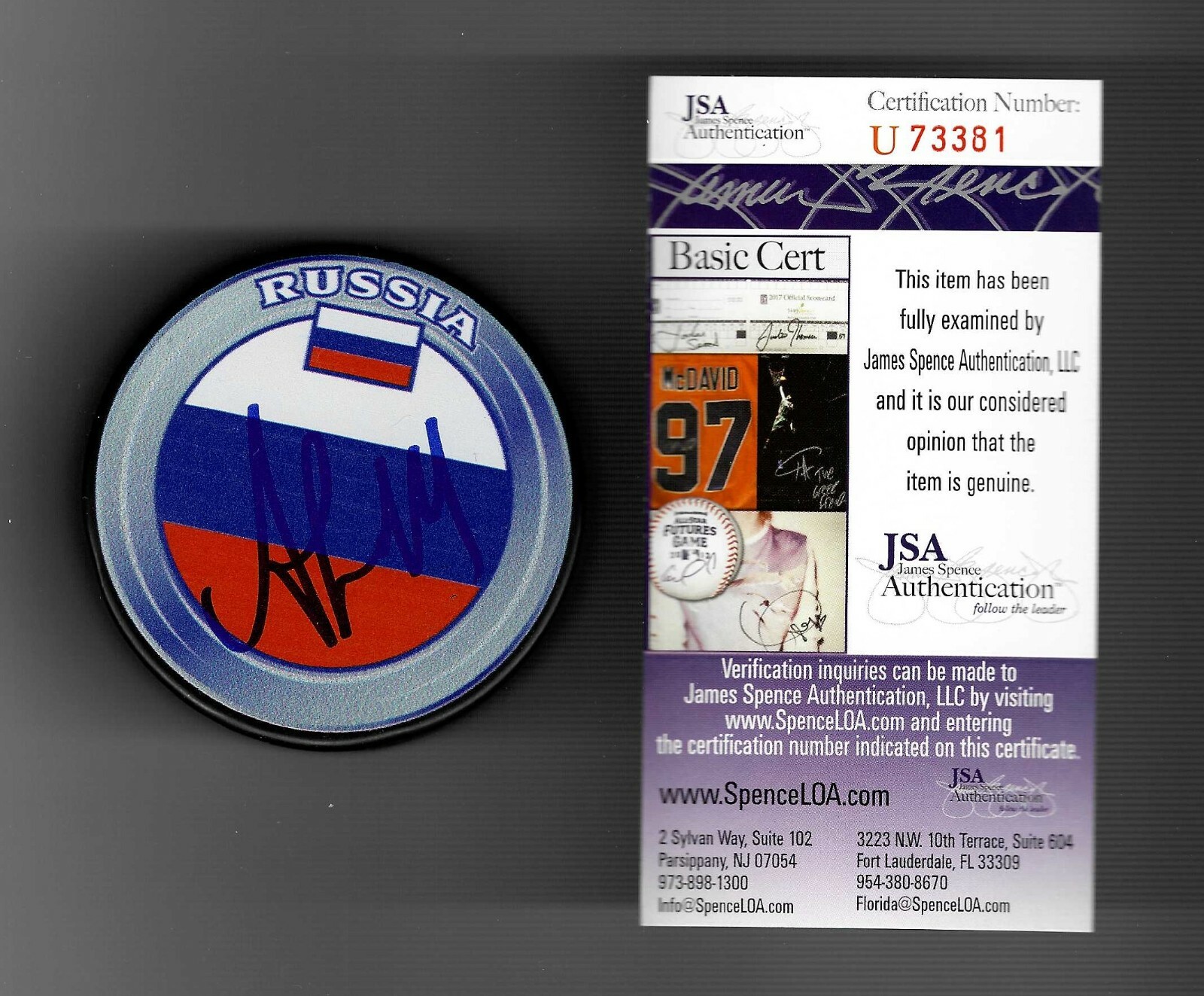 Andrei Svechnikov Signed Russia Hockey Puck Signed in English JSA Hurricanes