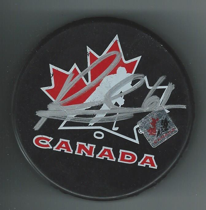 Ryan Suzuki Signed Team Canada Puck Barrie Colts