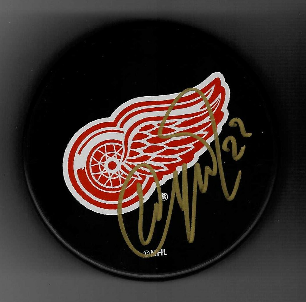 YURI BUTSYEV SIGNED DETROIT RED WINGS SOUVENIR PUCK SIGNED IN GOLD COLLECTIBLE MEMORABILIA