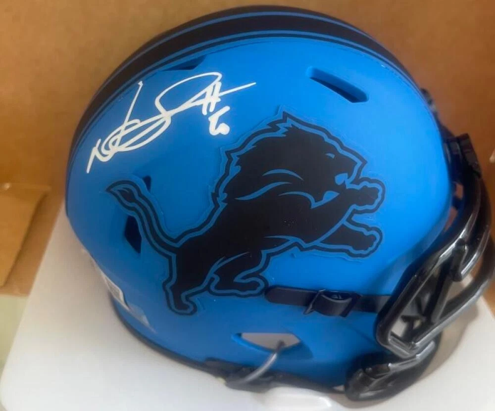 NDAMUKONG SUH SIGNED RAVE MINI HELMET BECKETT AUTHENTIC