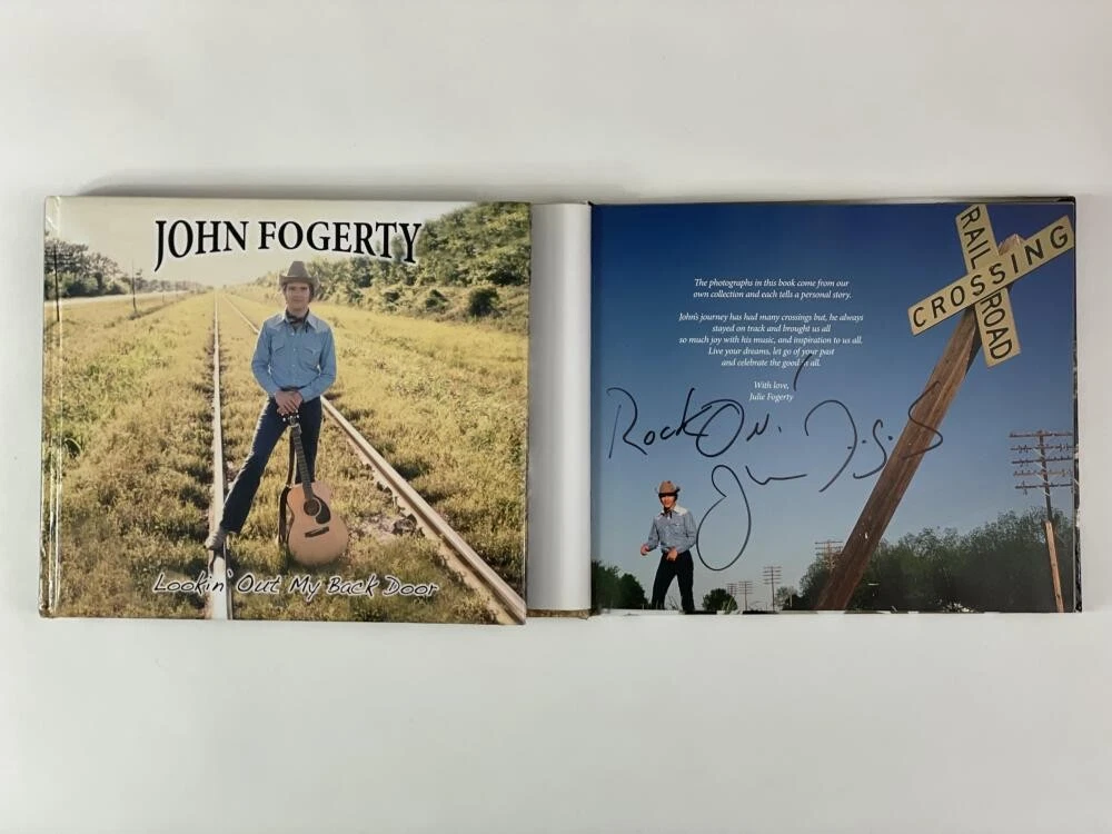 JOHN FOGERTY SIGNED LOOKIN OUT MY BACK DOOR BOOK - CREEDENCE CLEARWATER REVIVAL