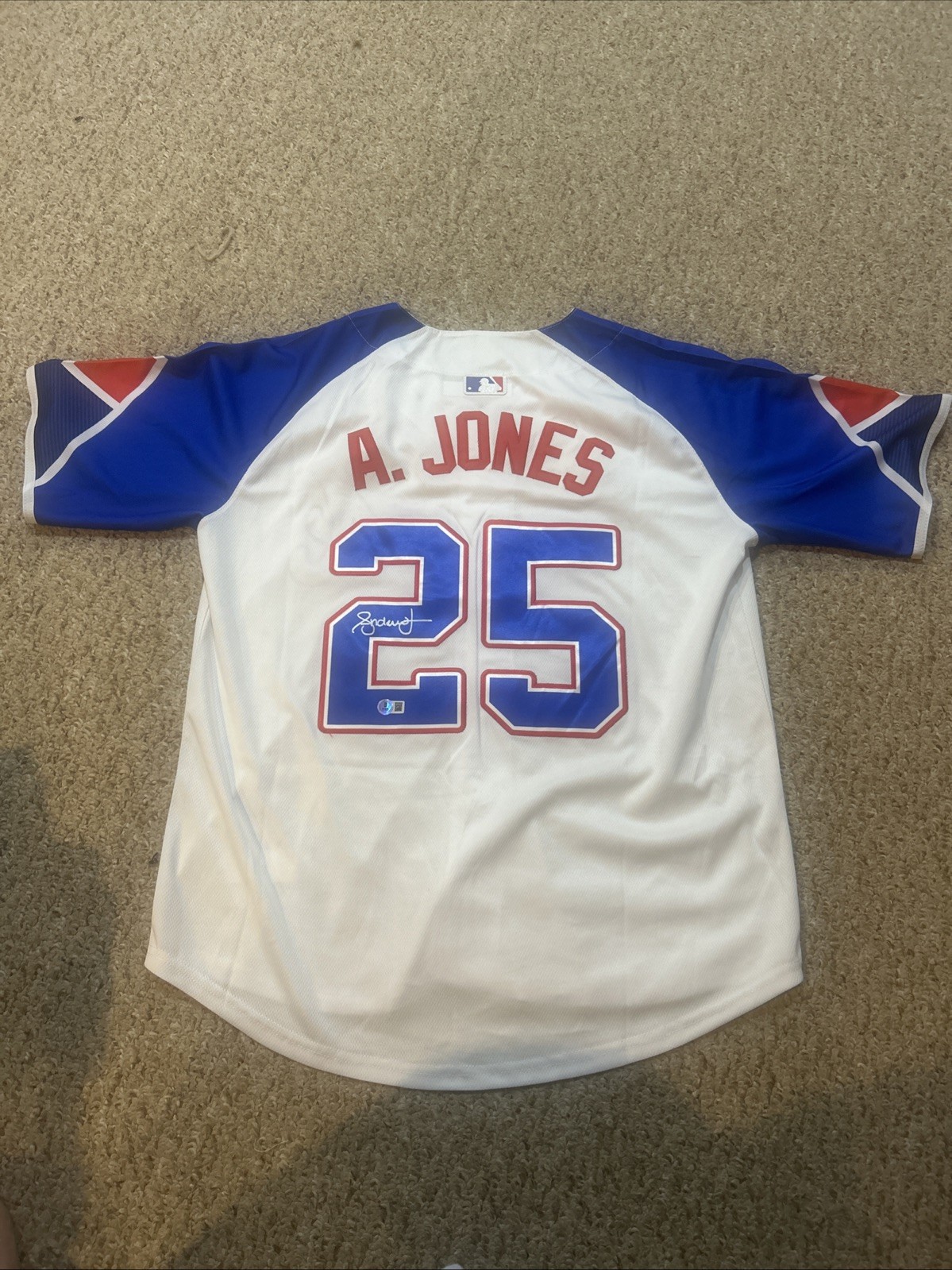 ATLANTA BRAVES- ANDRUW JONES SIGNED AUTOGRAPH JERSEY BECKETT COA CITY CONNECT