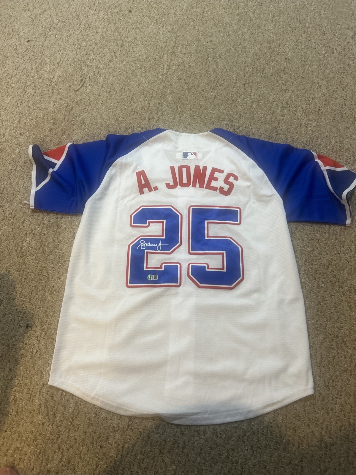 ATLANTA BRAVES- ANDRUW JONES SIGNED AUTOGRAPH JERSEY BECKETT COA CITY CONNECT