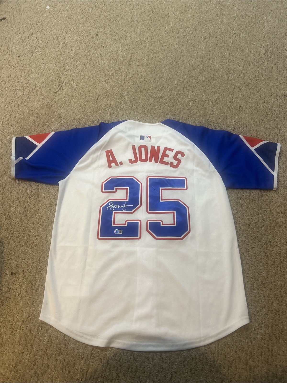 ATLANTA BRAVES- ANDRUW JONES SIGNED AUTOGRAPH JERSEY BECKETT COA CITY CONNECT