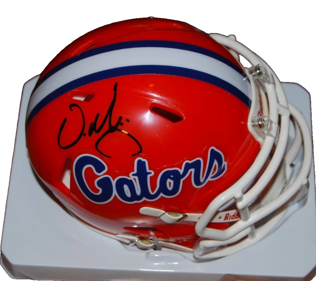 URBAN MEYER SIGNED (FLORIDA GATORS) MINI FOOTBALL HELMET BECKETT BAS BU41238 COLLECTIBLE MEMORABILIA