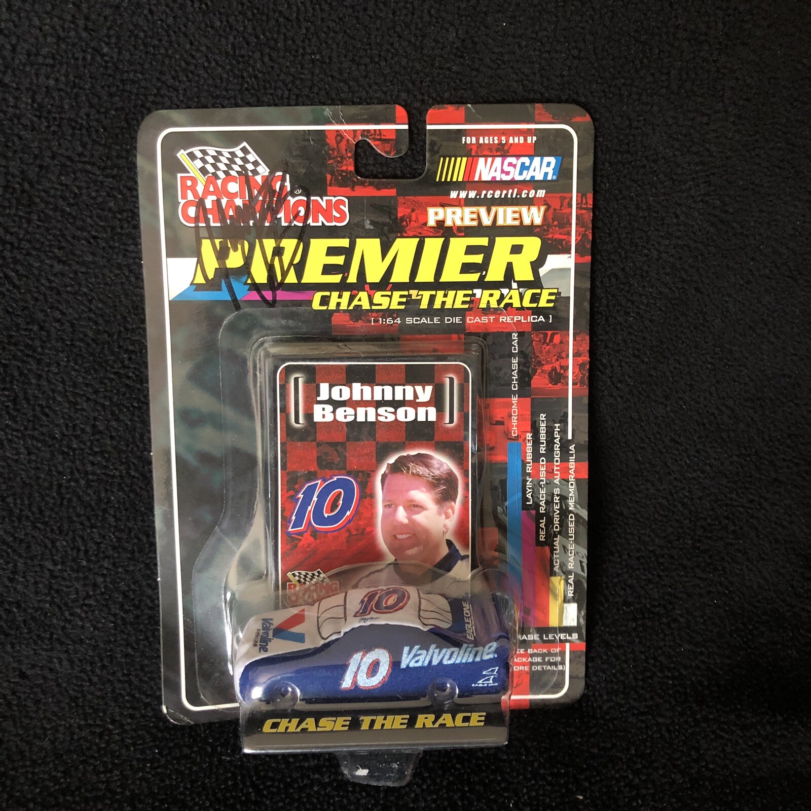 Johnny Benson Signed Racing Champions Valvoline 1:64 Scale Stock Car #1