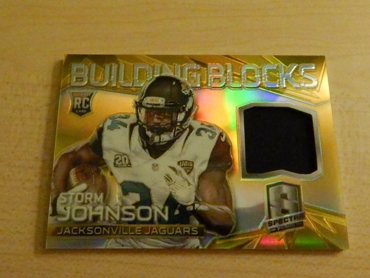 2014 PANINI SPECTRA STORM JOHNSON BUILDING BLOCKS JERSEY RC GOLD #ED /25