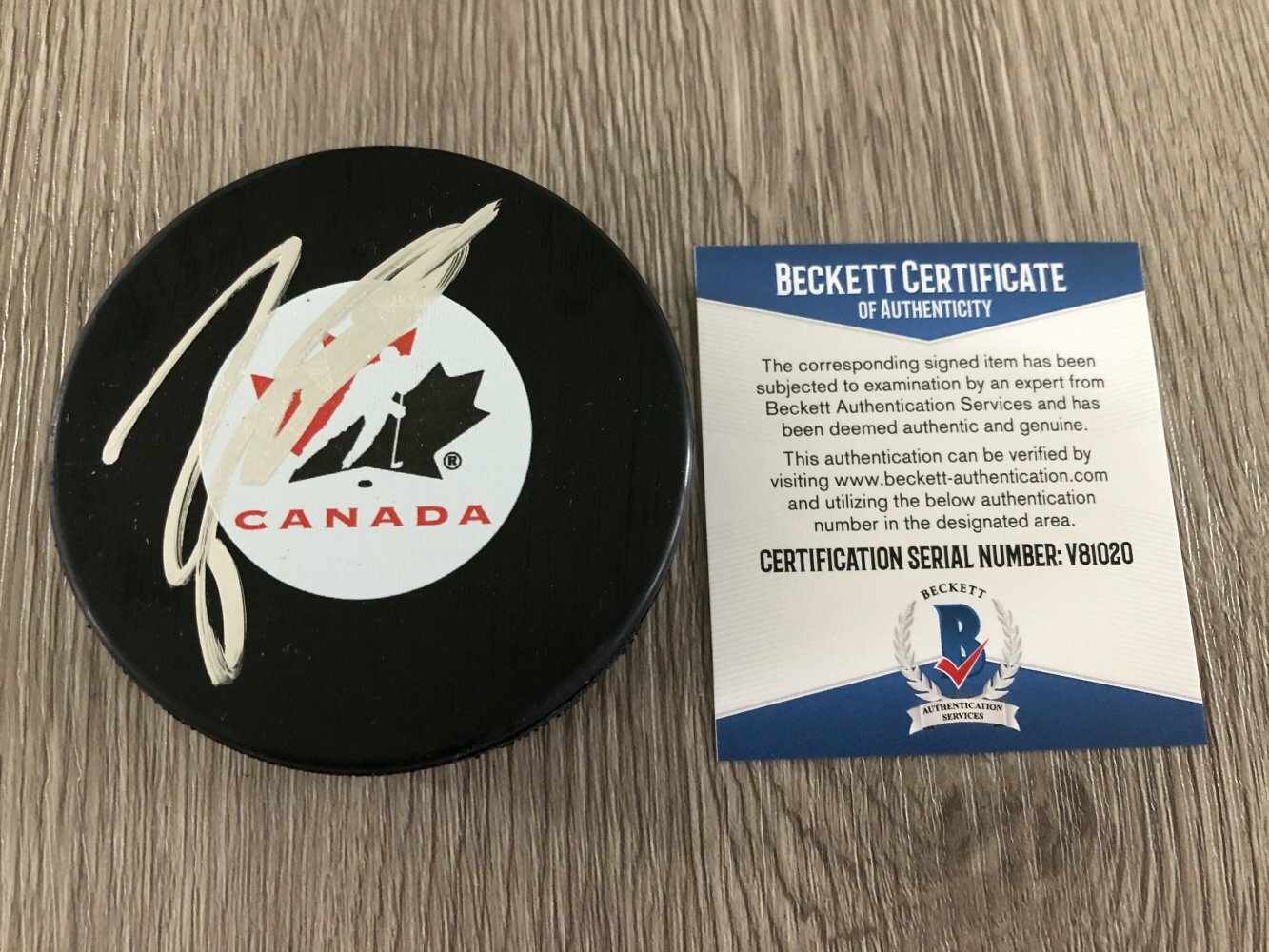TAYLOR HALL SIGNED TEAM CANADA PUCK ARIZONA COYOTES OILERS w/ BECKETT BAS COA