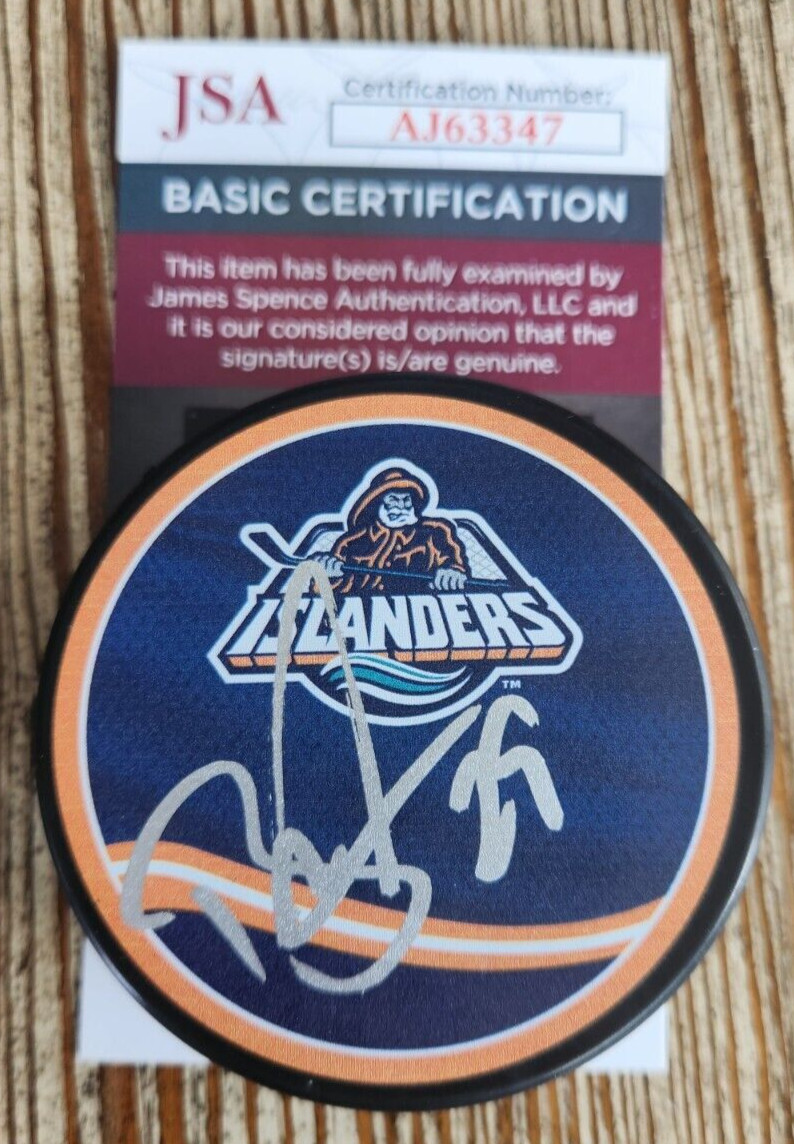 Brock Nelson Signed Reverse Retro Puck w/ JSA COA #AJ63347 New York Islanders