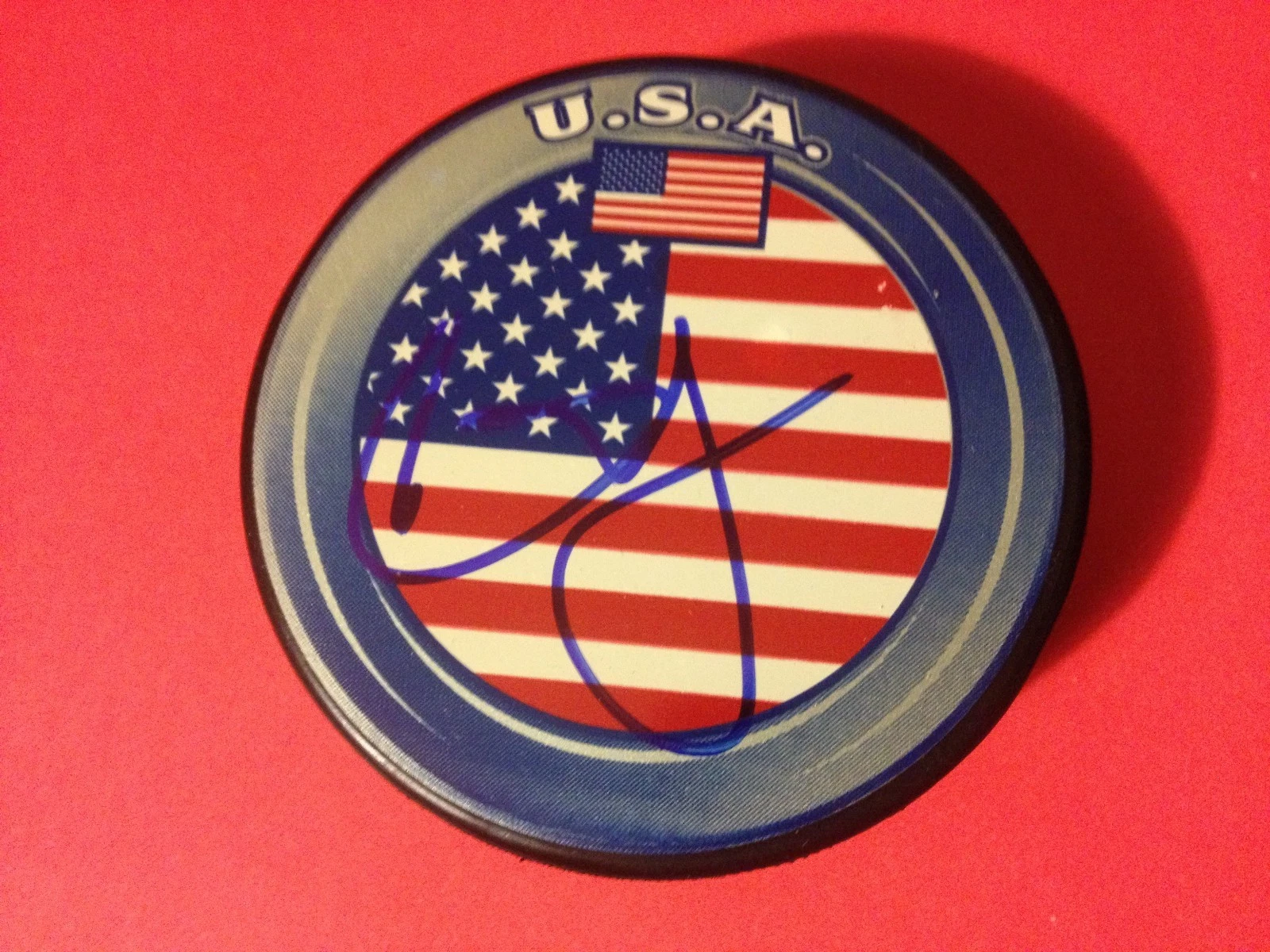 Erik Johnson Avalanche Olympic USA Flag Signed Auto Puck