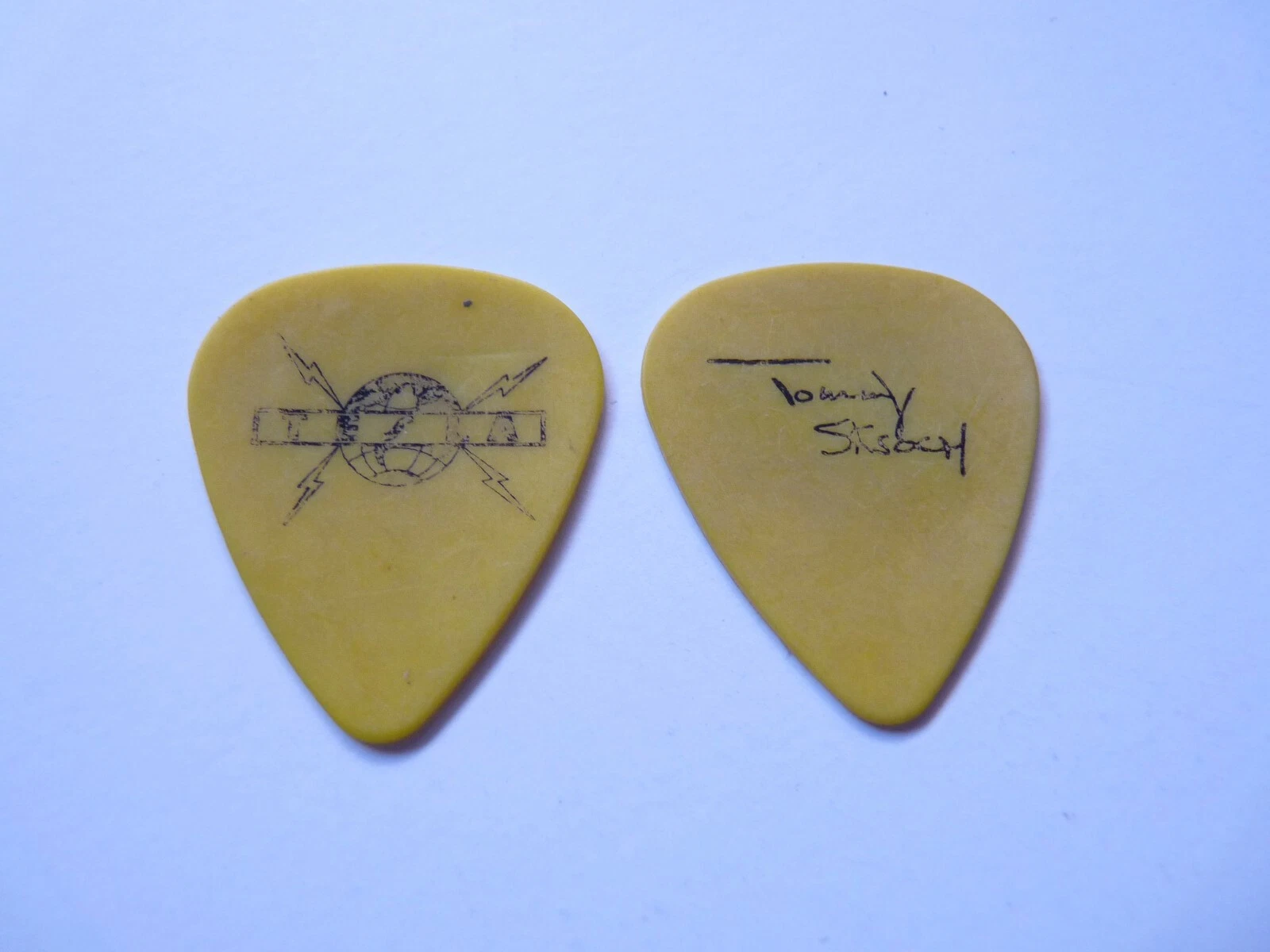 TELSA BAND BLACK ON YELLOW TOMMY SKEOTCH TOUR ISSUED GUITAR PICK RARE