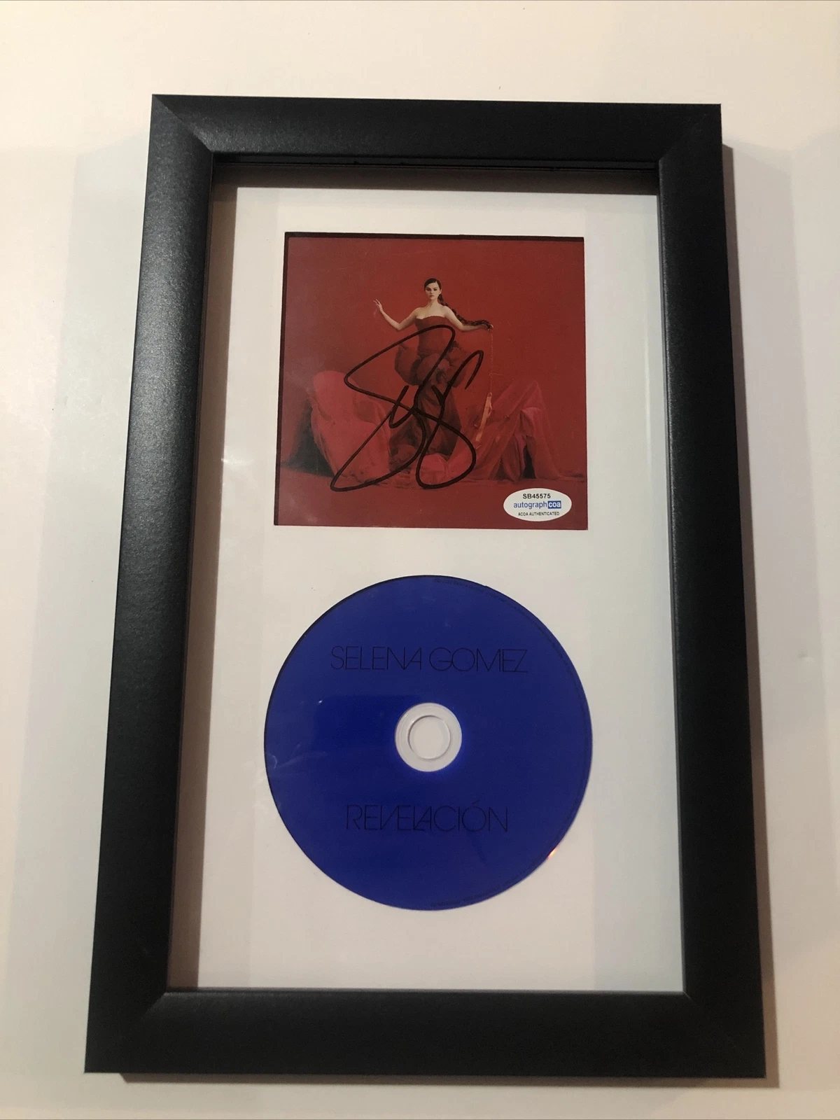 SELENA GOMEZ SIGNED AUTOGRAPH FRAMED CD DISPLAY REVELACION ACOA POP STAR