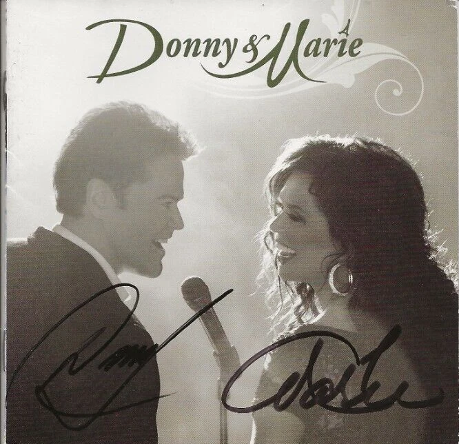Donny & Marie Osmond SIGNED Self Titled CD COA Autographed