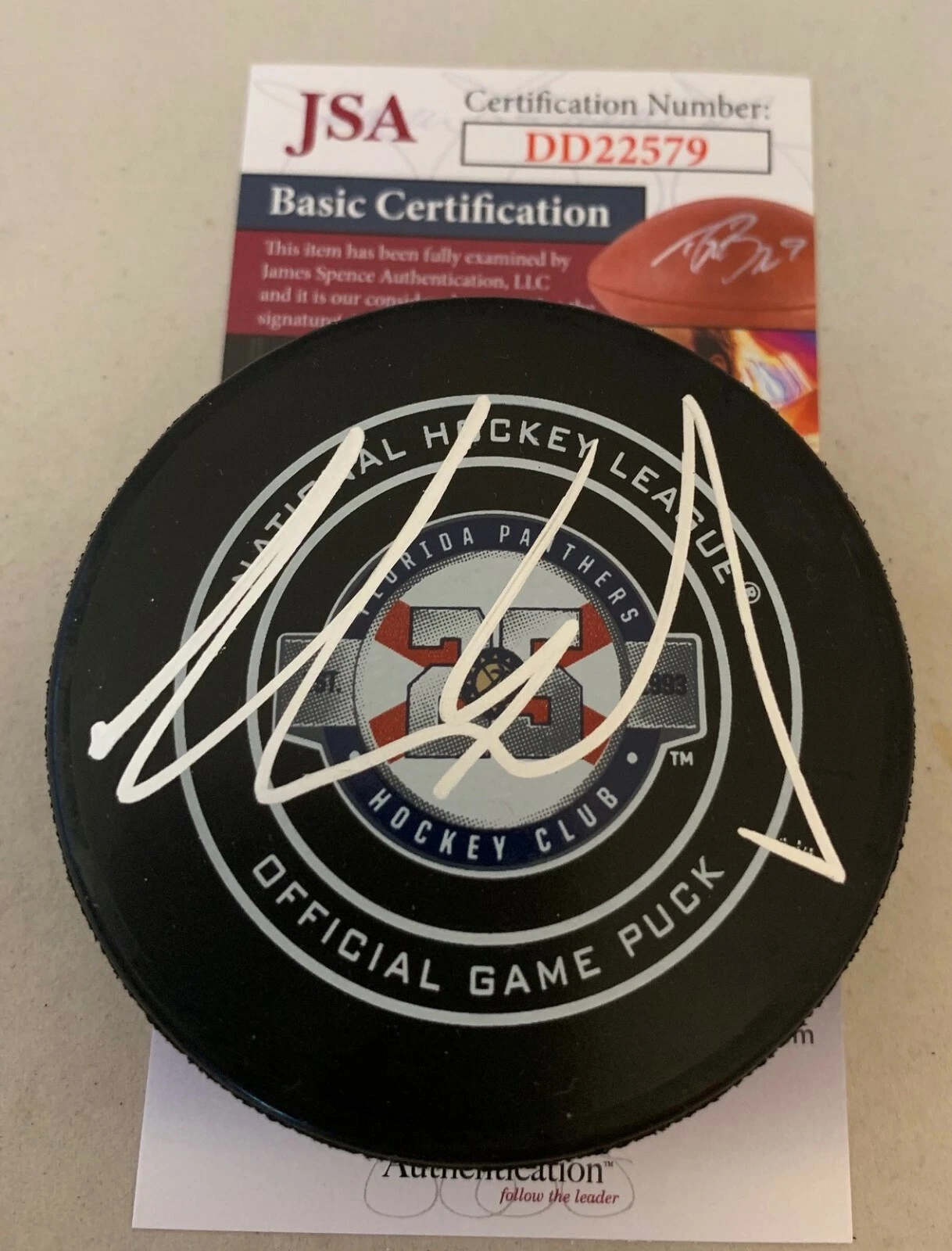 AARON EKBLAD SIGNED FLORIDA PANTHERS 25TH ANNIVERSARY OFFICIAL GAME PUCK JSA COLLECTIBLE MEMORABILIA