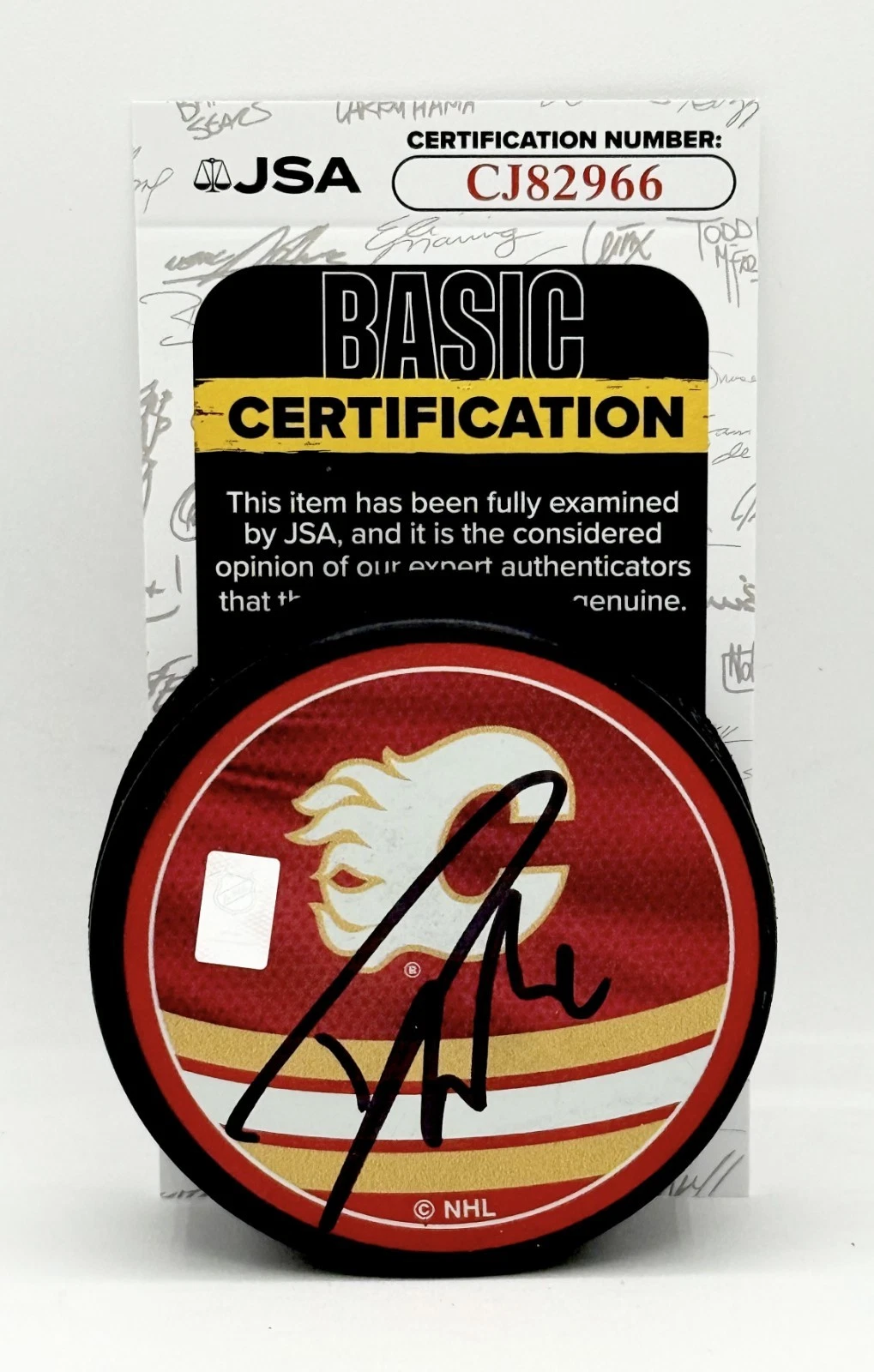 Dustin Wolf signed Calgary Flames Reverse Retro Puck autographed JSA