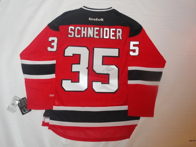 CORY SCHNEIDER SIGNED #35 RBK NEW JERSEY DEVILS JERSEY PROOF JSA COA LICENSED