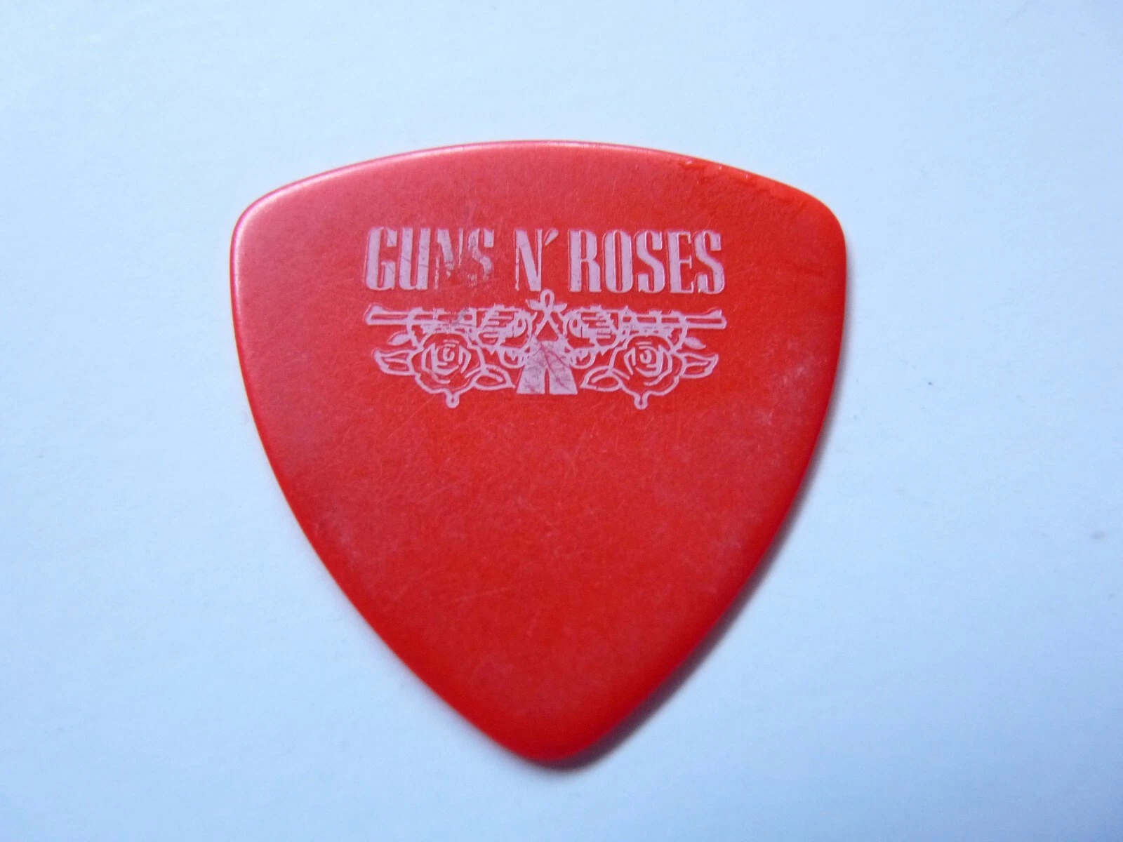 IZZY STRADLIN RARE COLOR WHITE ON RED 1991 ILLUSIONS TOUR ISSUED GUITAR PICK