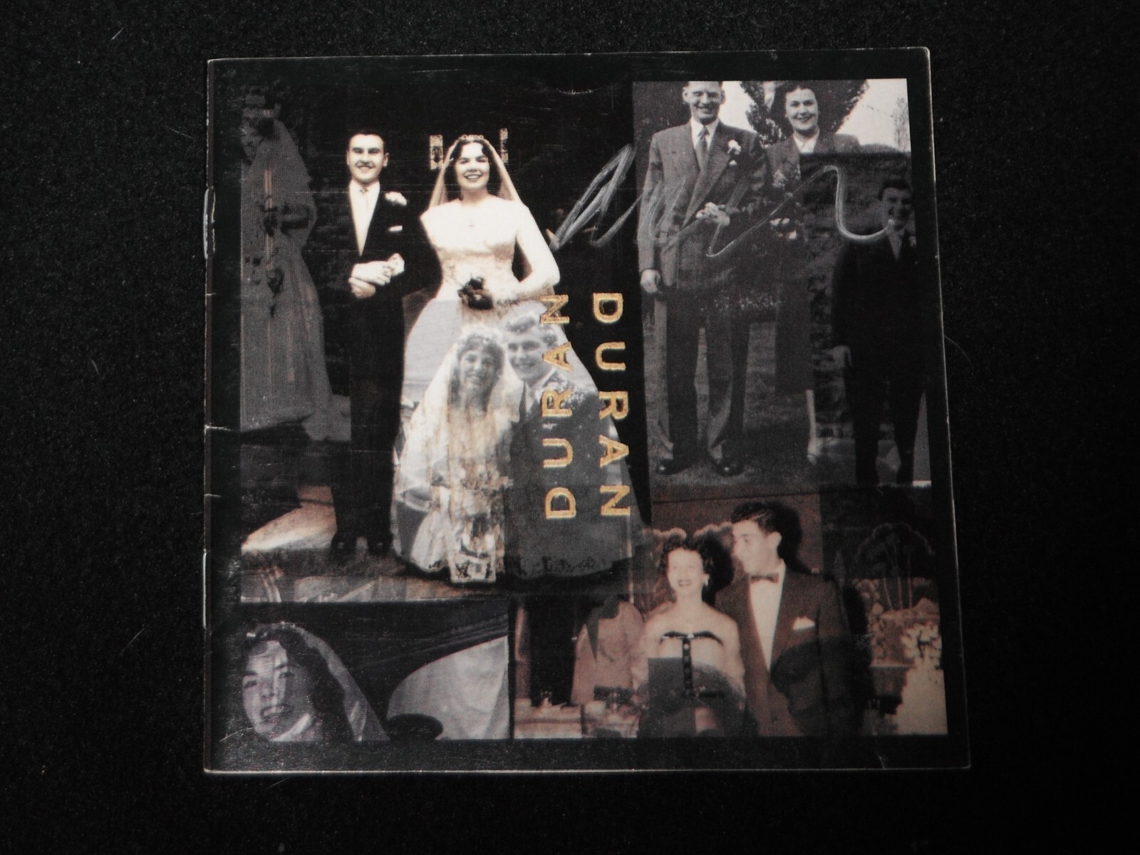 DURAN DURAN JOHN TAYLOR SIGNED 1993 CD COVER