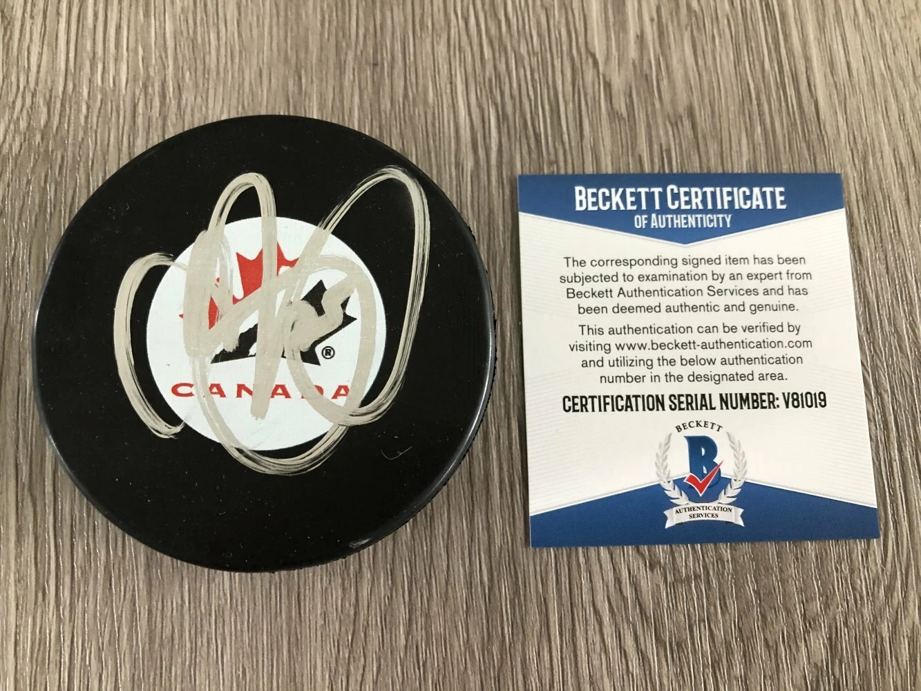 CHRIS PRONGER SIGNED AUTOGRAPH TEAM CANADA PUCK w/ BECKETT BAS COA