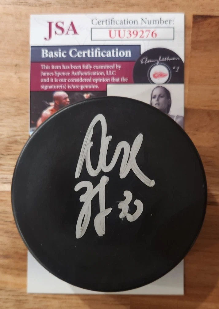 Dustin Byfuglien Signed Puck w JSA COA #UU39276 Winnipeg Jets Chicago Blackhawks