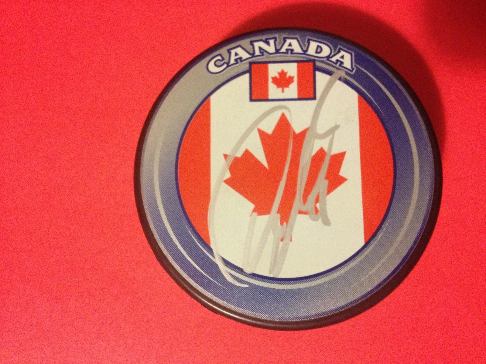 Owen Nolan Sharks Nordiques Team Canada Flag Signed Puck Auto
