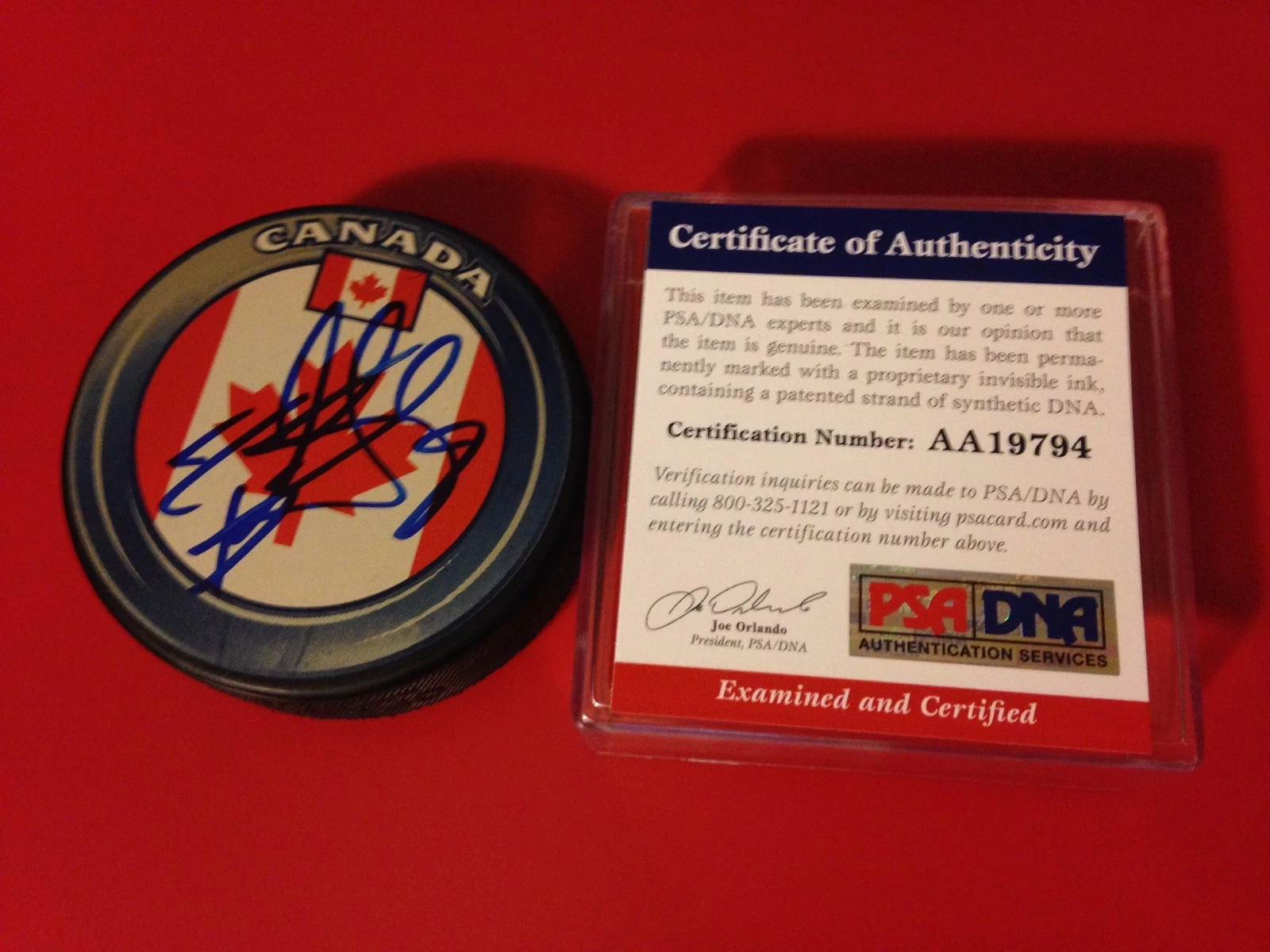 Ryan Getzlaf Ducks Hockey Team Canada Flag Signed Puck Auto PSA/DNA COA