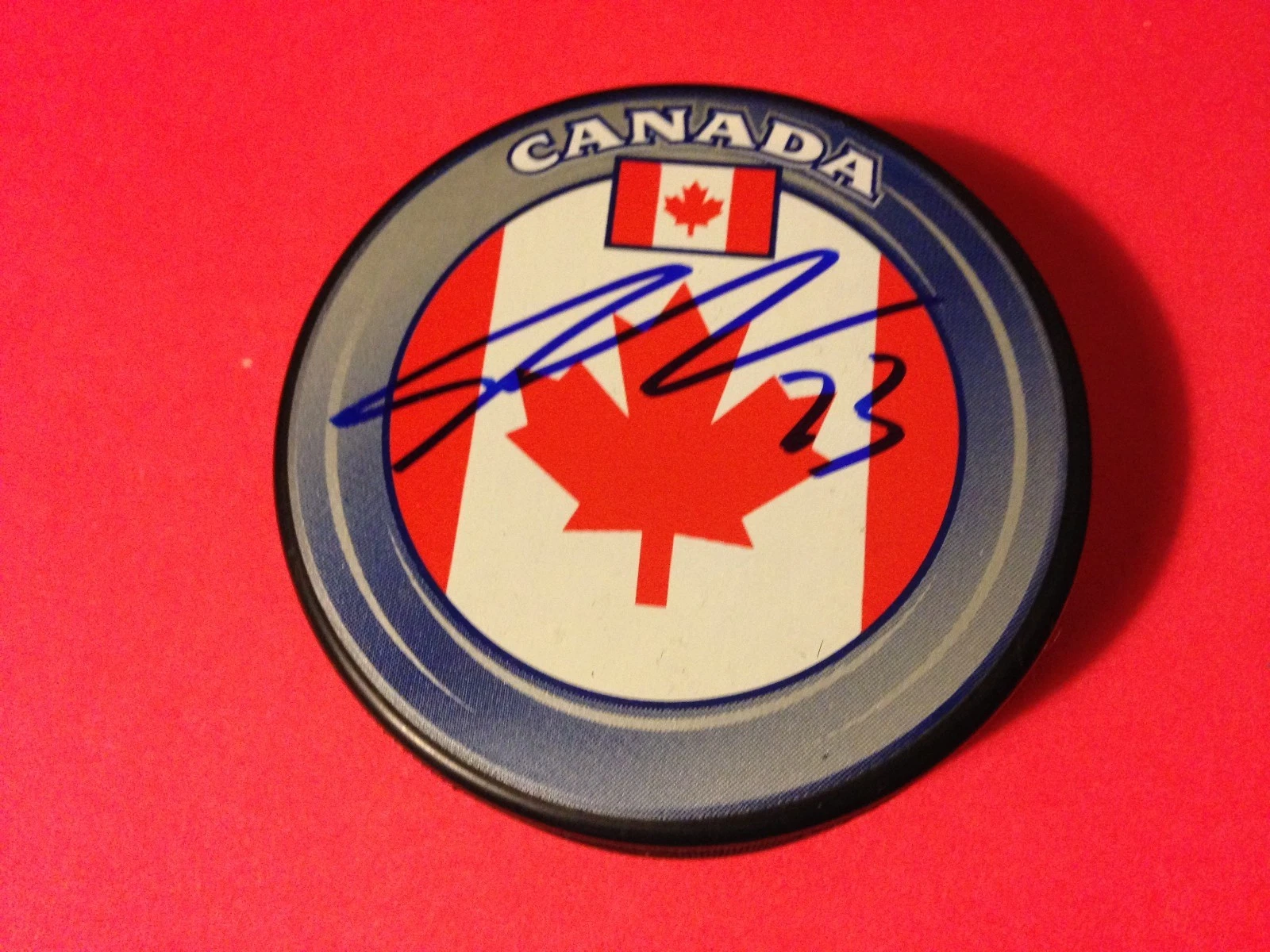 Sean Monahan Flames Team Canada Flag Signed Puck Auto