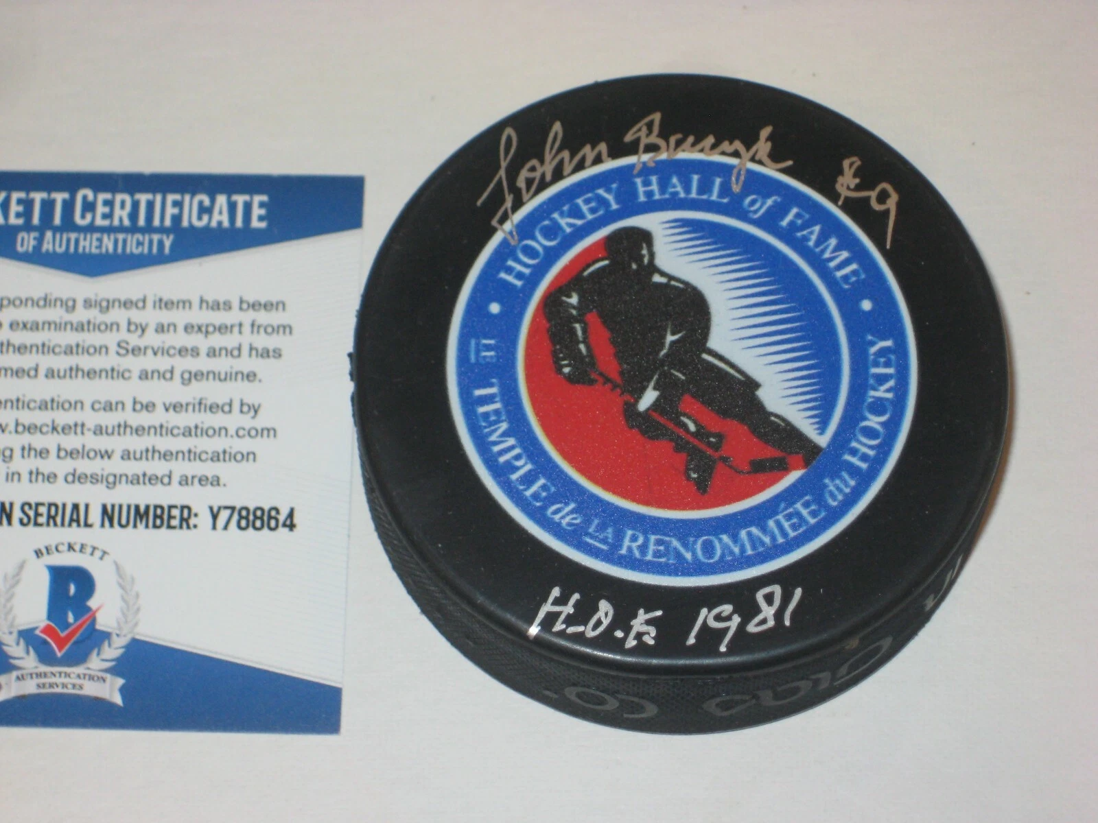 JOHN BUCYK (Boston Bruins) Signed HALL OF FAME Puck w/ Beckett COA & HOF Inscrip
