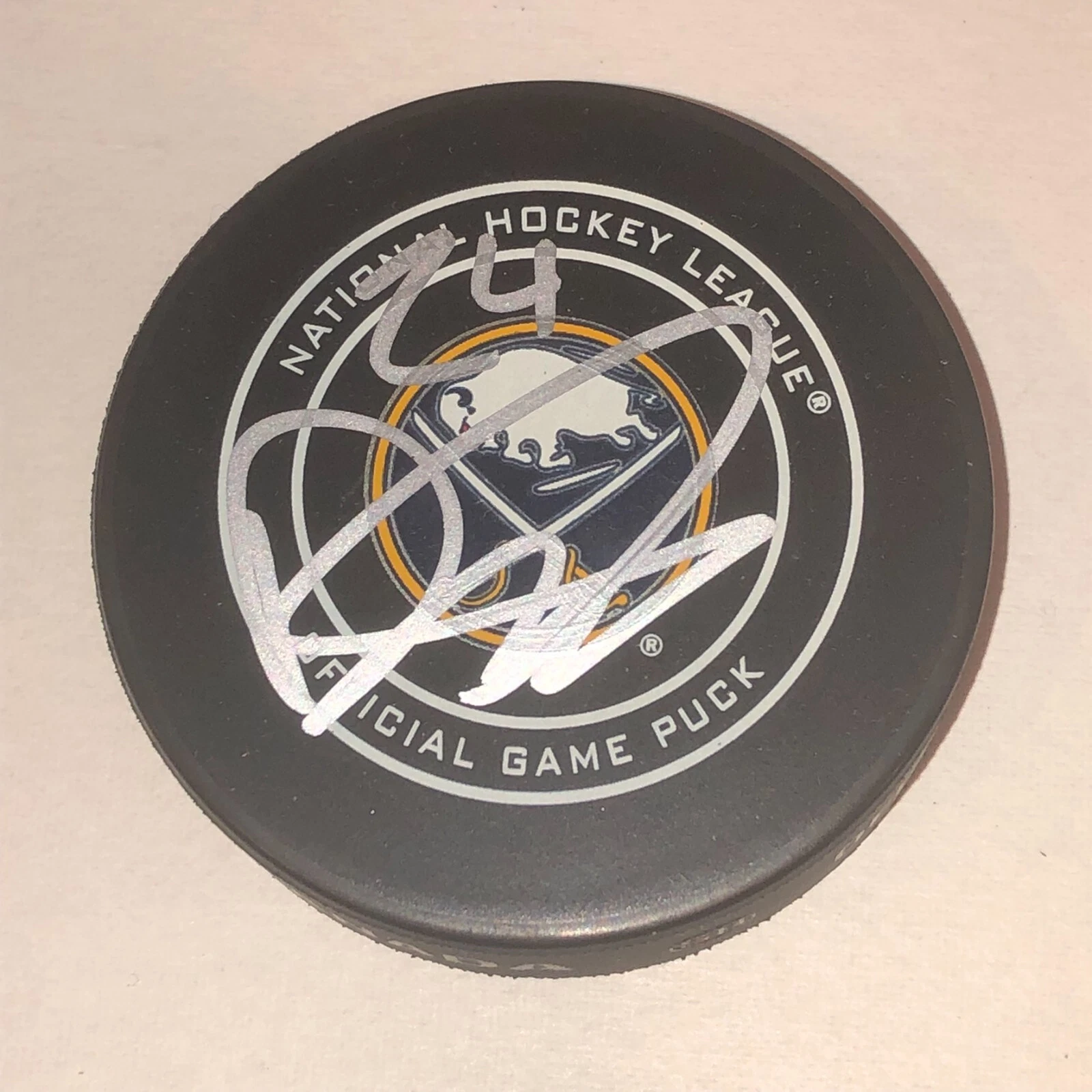 DYLAN COZENS Signed Buffalo SABRES Official GAME Puck Beckett Authenticated