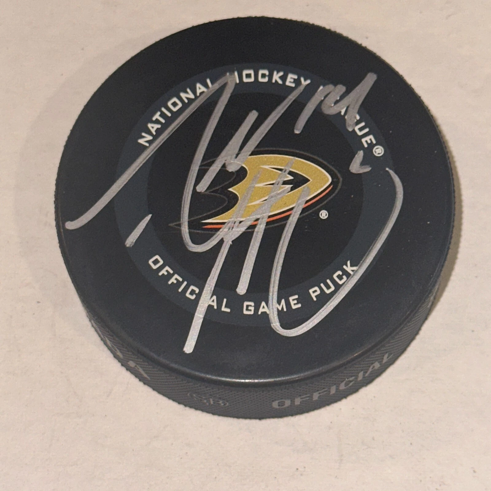 ADAM HENRIQUE Signed Anaheim DUCKS Official GAME Puck Beckett Auth. (BAS)