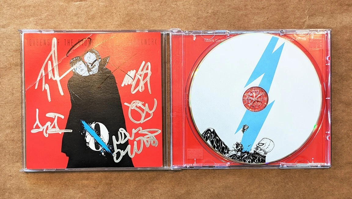 Queens Of The Stone Age REAL hand SIGNED Like Clockwork CD COA Josh Homme +5