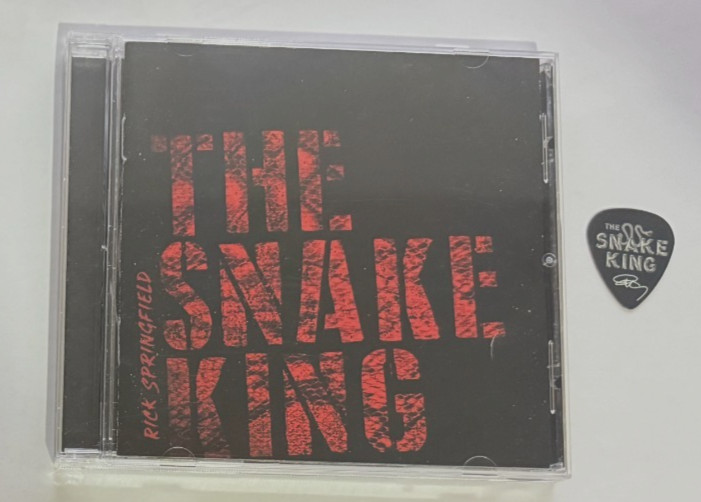 RICK SPRINGFIELD THE SNAKE KING UNPLAYED CD + SIGNATURE TOUR GUITAR PICK COLLECTIBLE MEMORABILIA