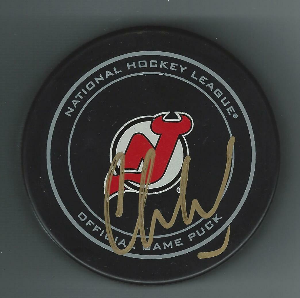 Cory Schneider Signed New Jersey Devils NHL 100 Official Game Puck Gold