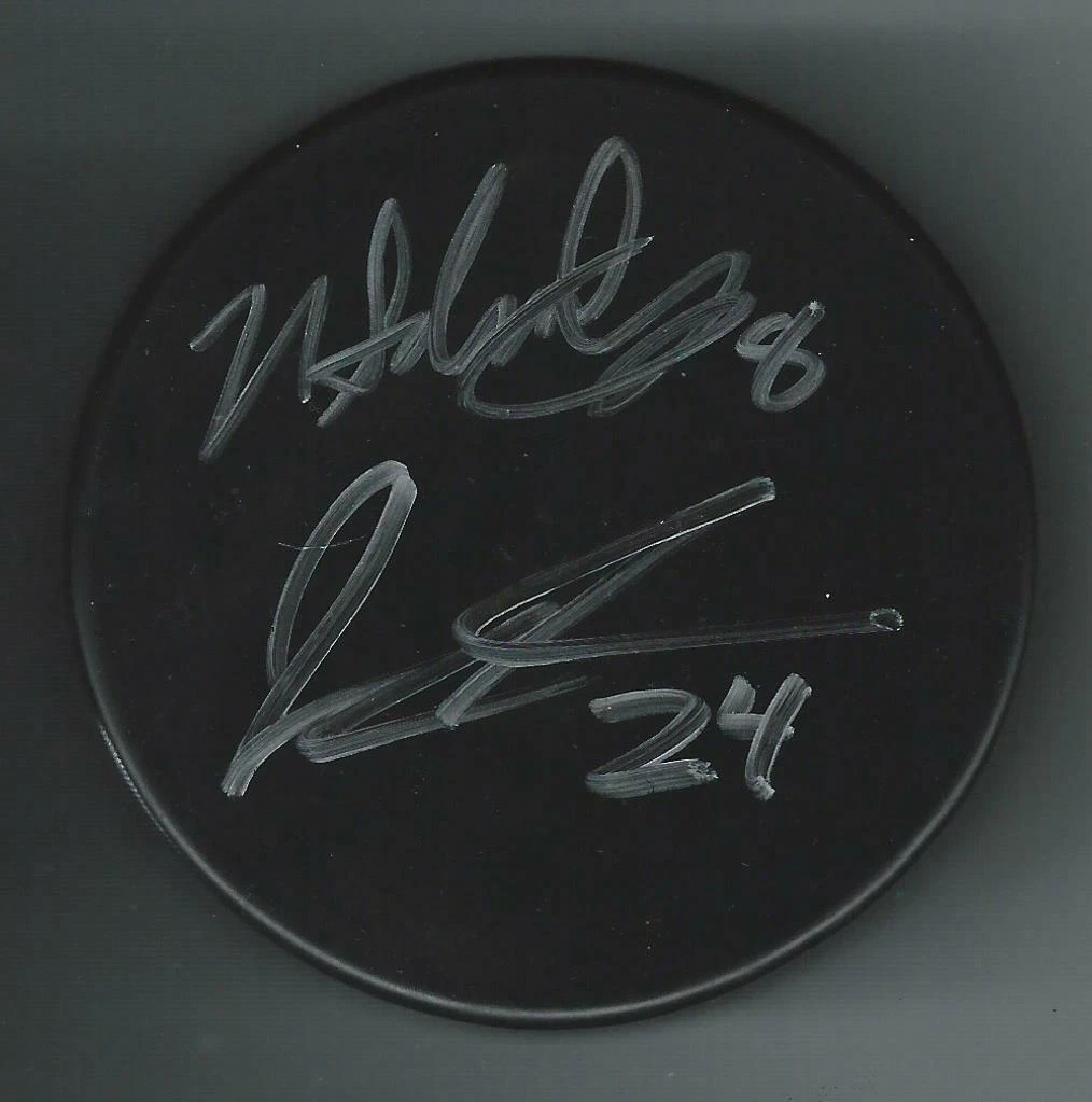 Jordan & Nick Schmaltz Signed North Dakota Fighting Hawks Puck Siouix