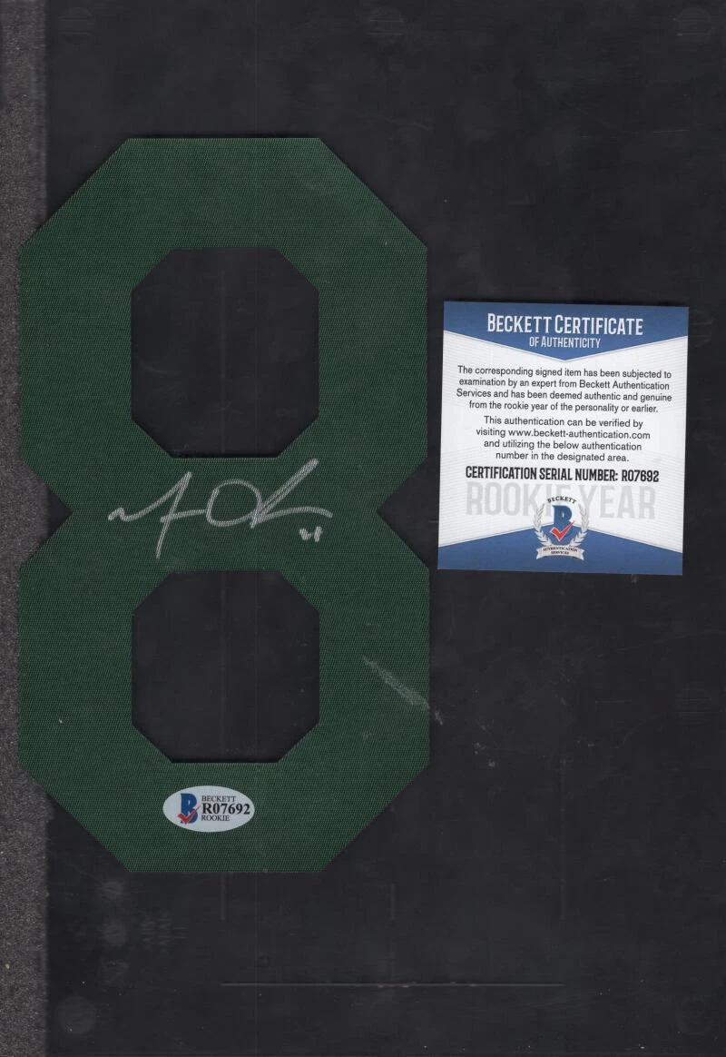 MATT OLSEN SIGNED GREEN #8 JERSEY NUMBER BECKETT R07692