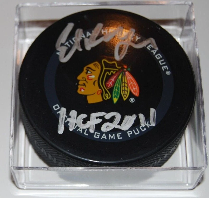 ED BELFOUR signed (CHICAGO BLACKHAWKS) Official game hockey puck BECKETT BG03060