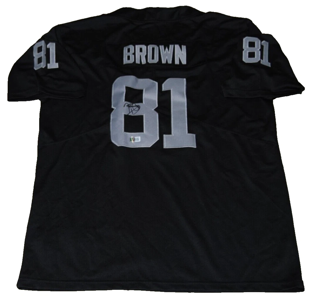 TIM BROWN signed (OAKLAND RAIDERS) custom football jersey BECKETT BAS BP89858