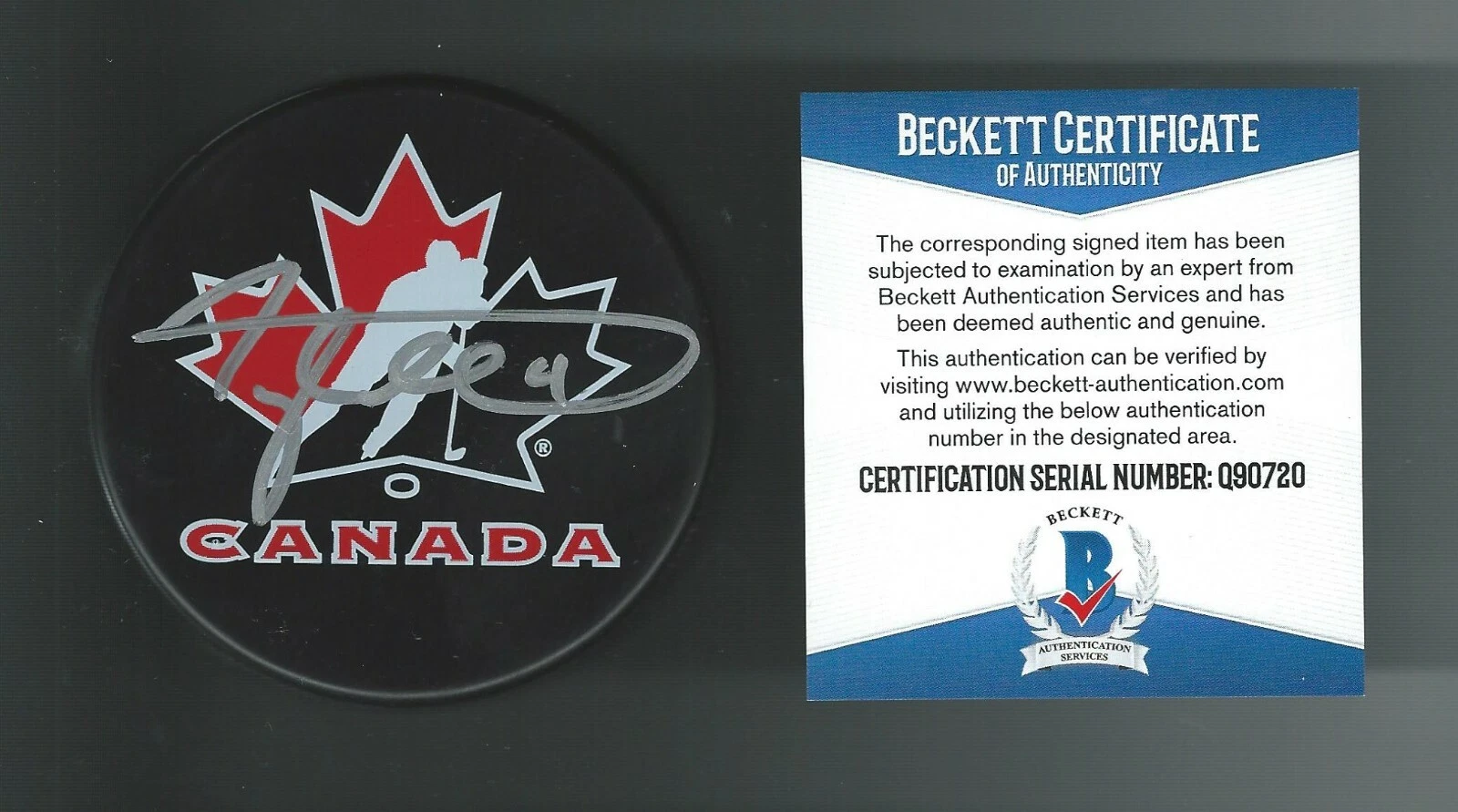 Taylor Hall Signed Team Canada Hockey Puck Beckett COA Q90720 Boston Bruins